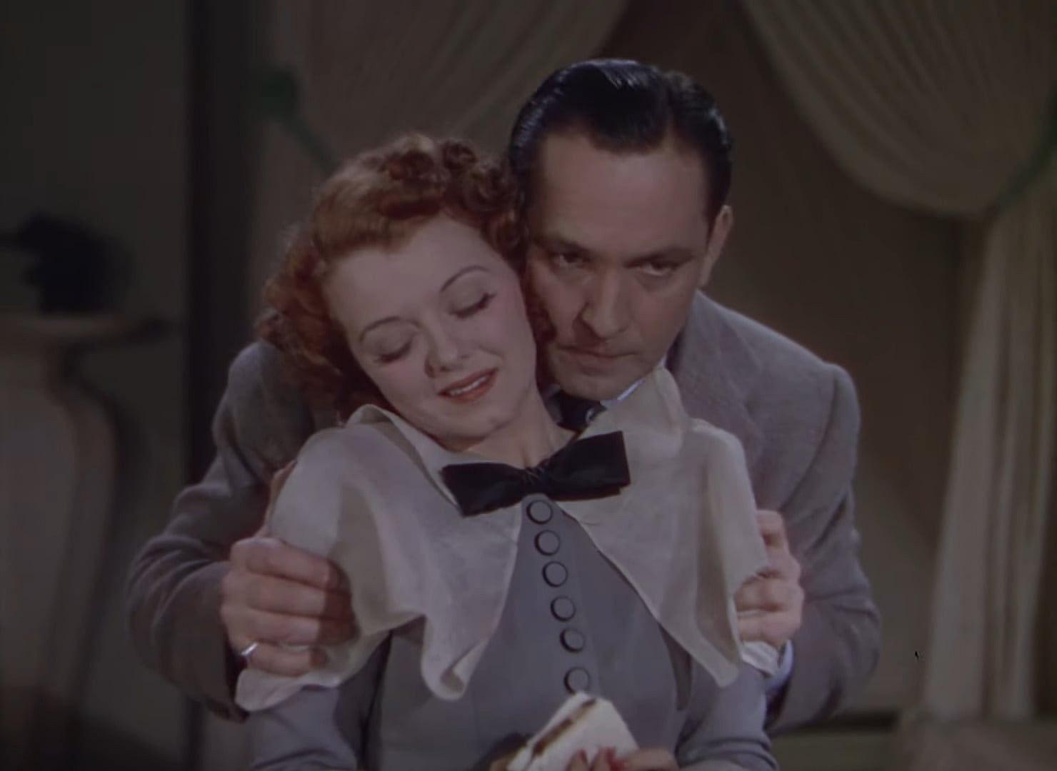 Vicki Lester and Norman Maine embrace in A Star Is Born (1937), Warner Bros. Pictures