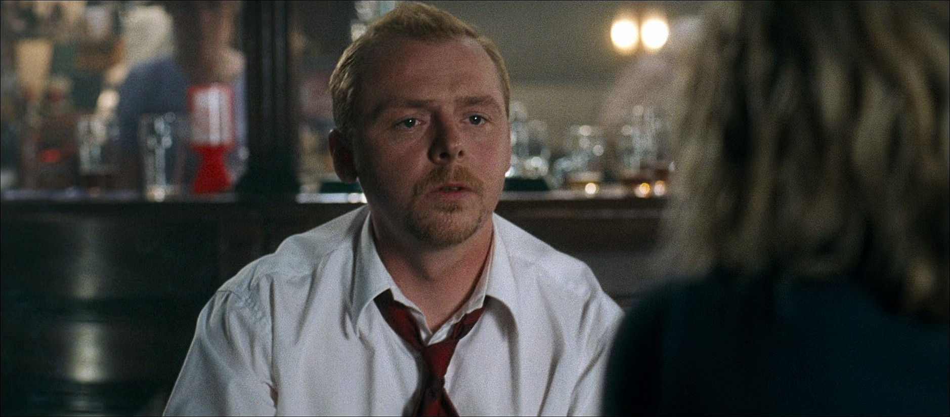Shaun (Simon Pegg) has a tough conversation with Liz (Kate Ashfield) in Shaun of the Dead (2004), Universal Pictures