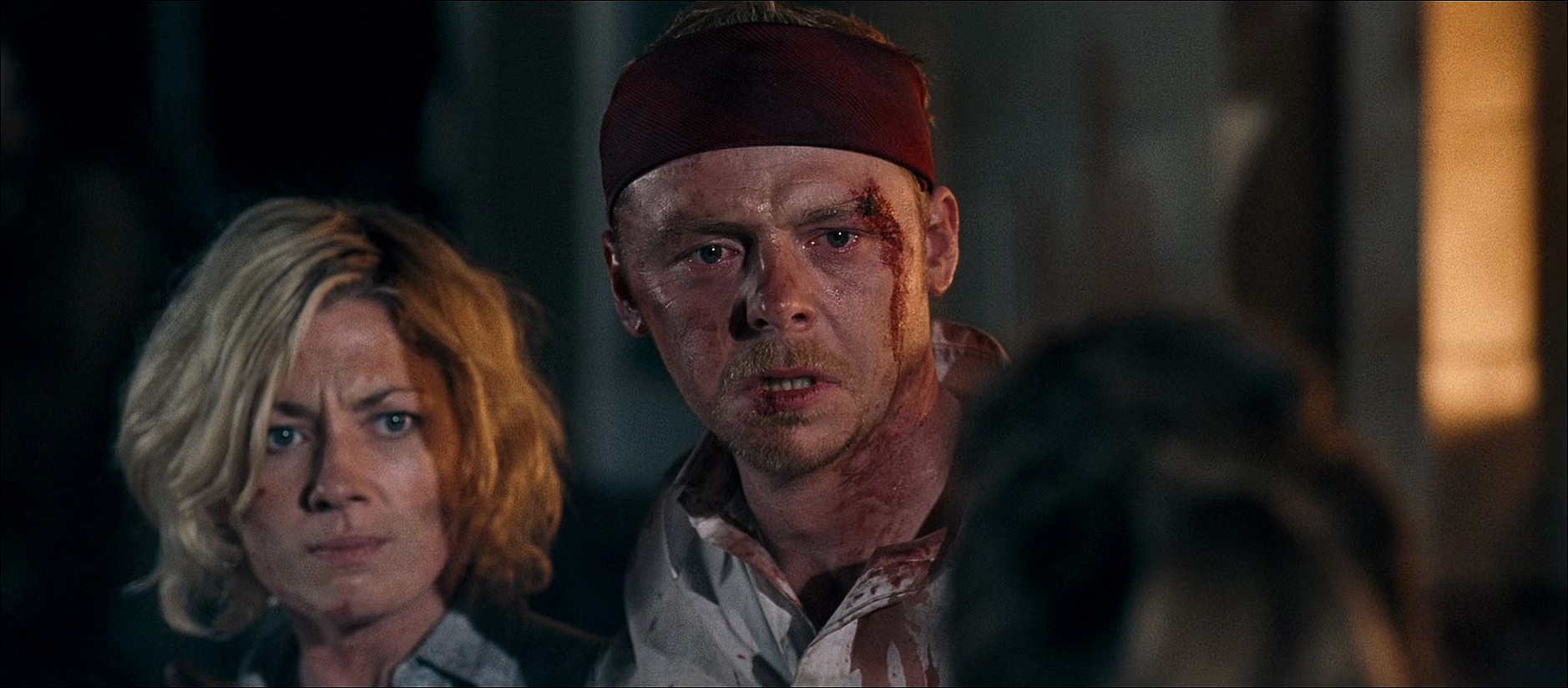 Liz (Kate Ashfield) and Shaun (Simon Pegg) find a light at the end of the undead tunnel in Shaun of the Dead (2004), Universal Pictures