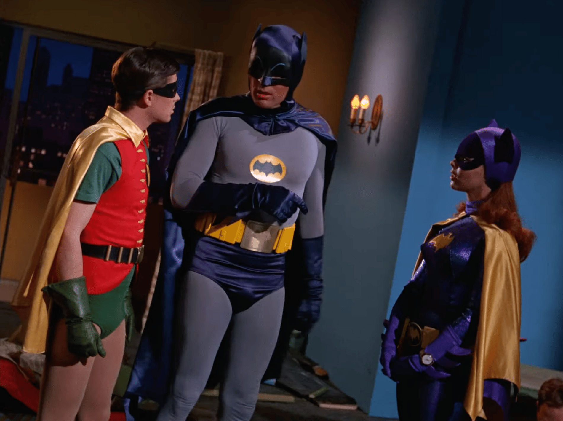 Batman (Adam West) and Robin (Burt Ward) make the acquaintance of Batgirl (Yvonne Craig) in Batman Season 3 Episode 1 "Enter Batgirl, Exit Penguin" (1966), Greenway Productions