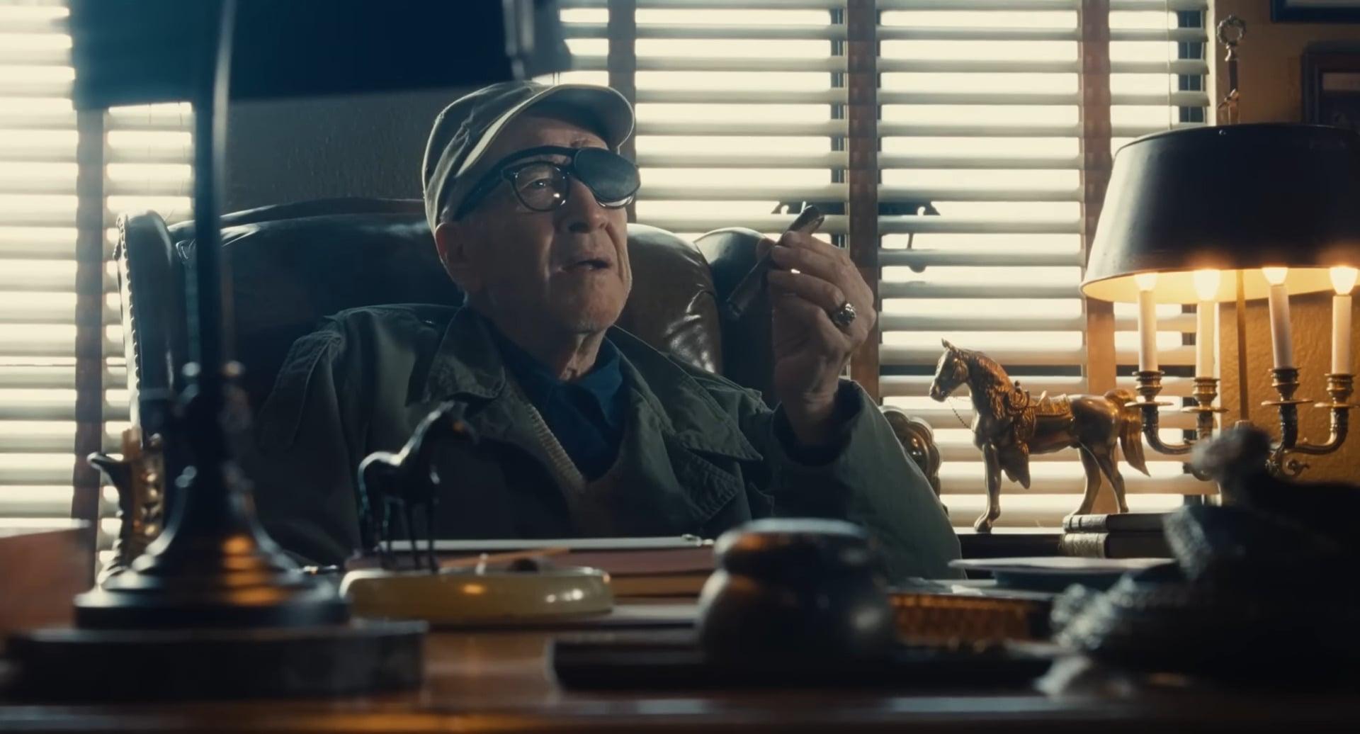 John Ford (David Lynch) enjoys a fine cigar in The Fabelmans (2022), Universal Pictures