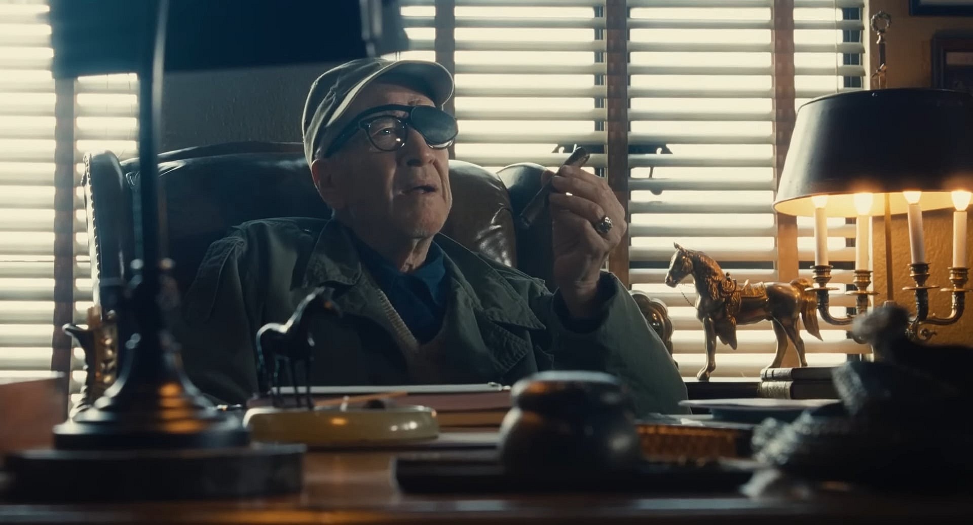 John Ford (David Lynch) enjoys a fine cigar in The Fabelmans (2022), Universal Pictures