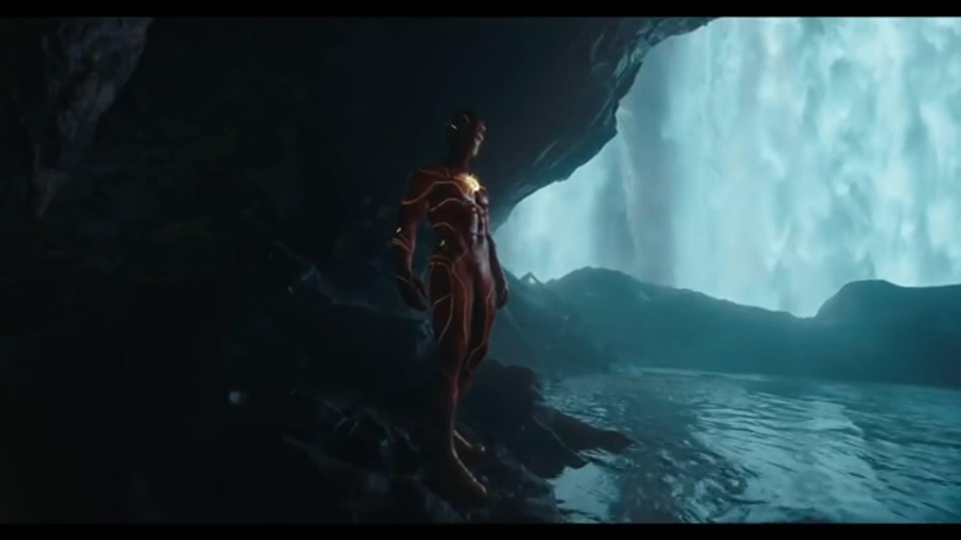 Barry Allen (Ezra Miller) dons his upgraded suit in The Flash (2023), Warner Bros. Pictures