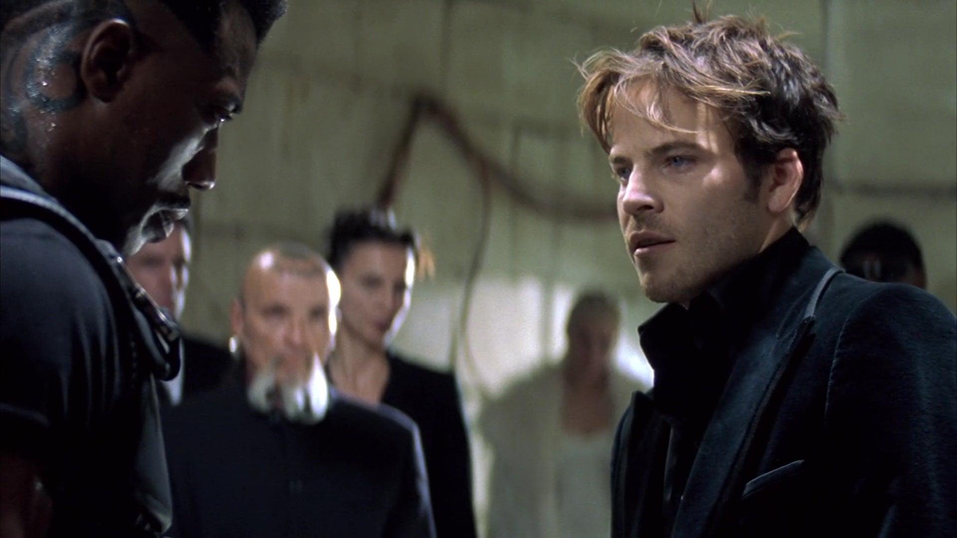 Deacon Frost (Stephen Dorff) tells Blade (Wesley Snipes) to prepare for the coming of La Magra in Blade (1998), Marvel Entertainment