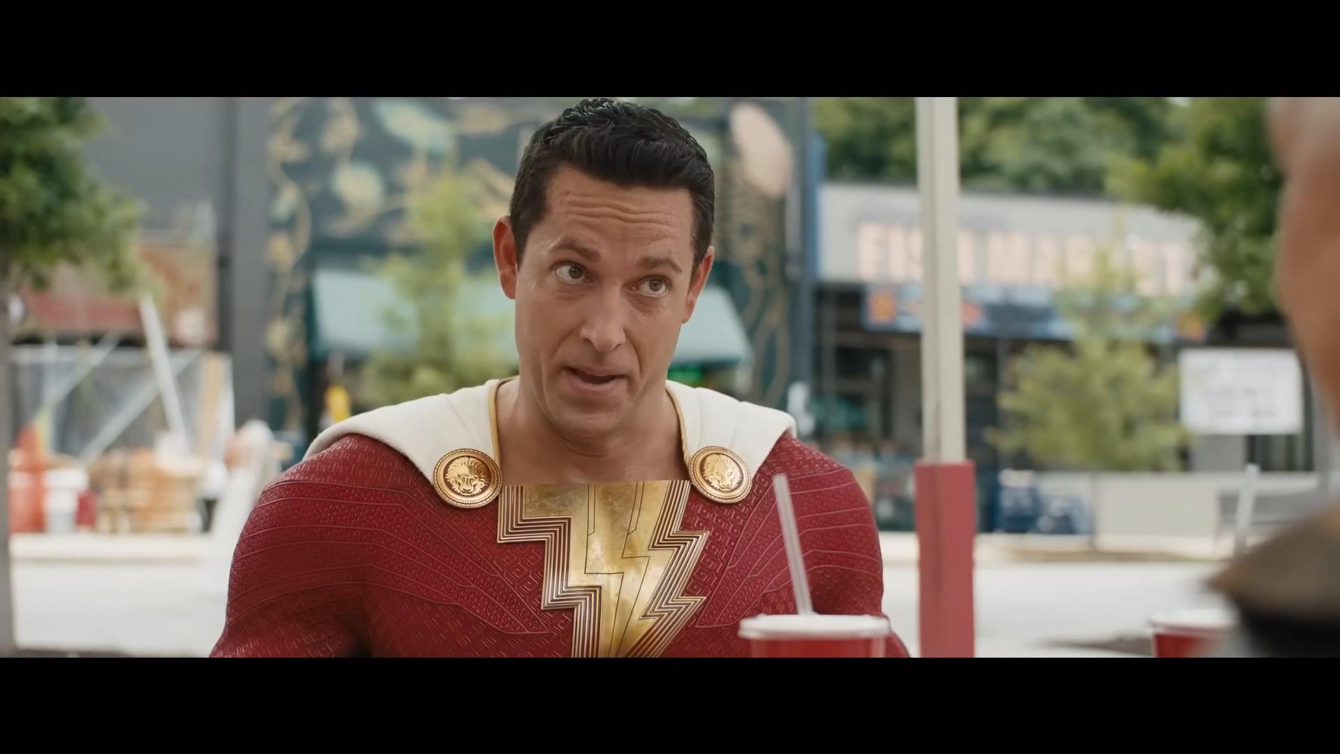 Billy Batson (Zachary Levi) isn't buying what Hespera (Helen Mirren) is selling in Shazam! Fury of the Gods (2023), DC Studios