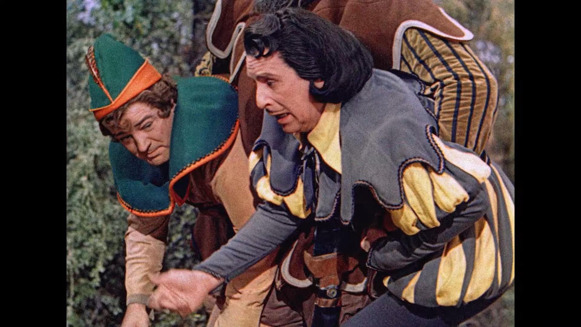Jack (Lou Costello) and Mr. Dinklepuss (Bud Abbott) are captured by The Giant (Buddy Baer) in Jack and the Beanstalk (1952), Warner Bros. Pictures