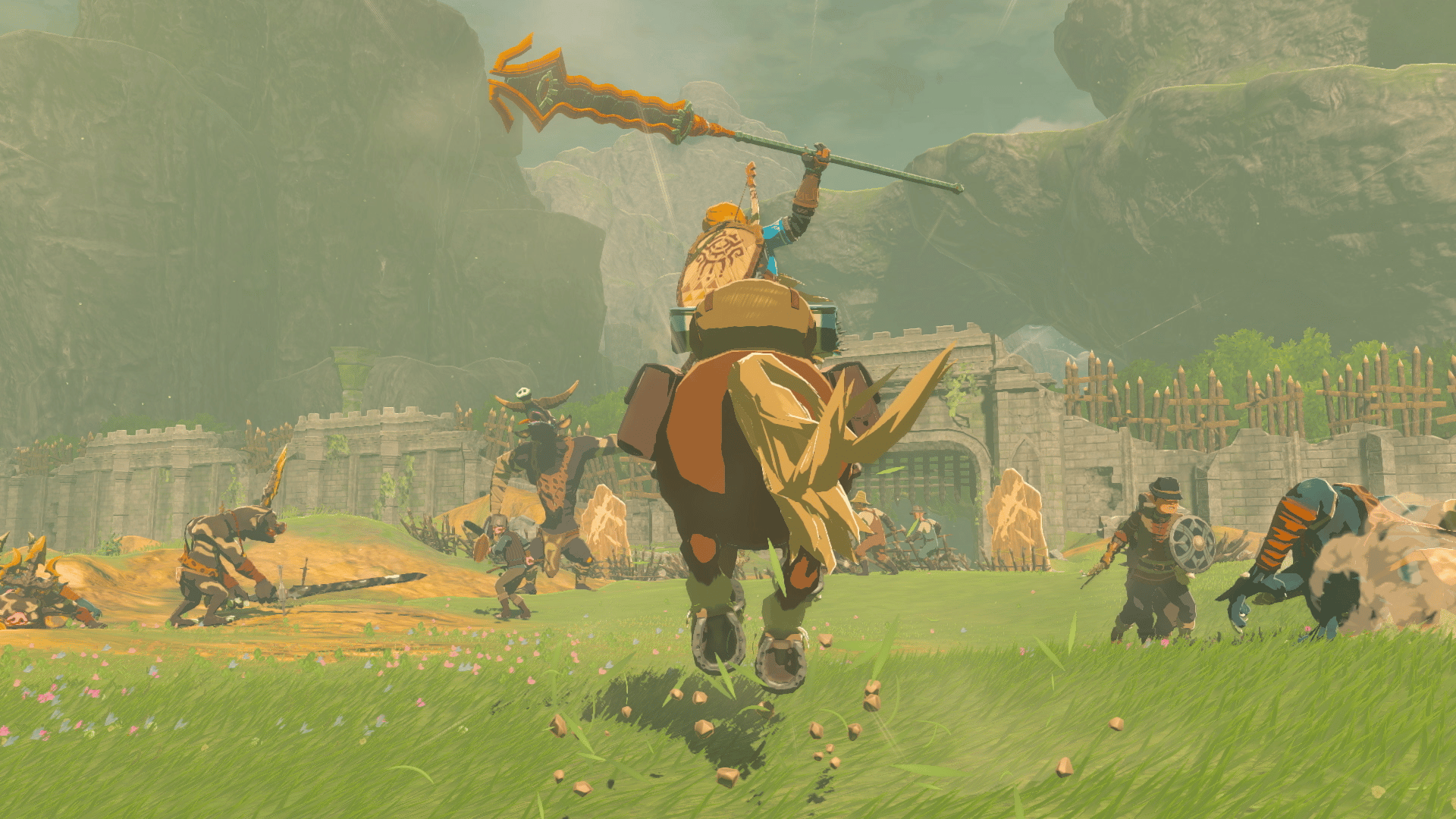 Link charges into battle on horseback, as Hylians fight Bokoblins and Moblins in The Legend of Zelda: Tears of the Kingdom (2023), Nintendo