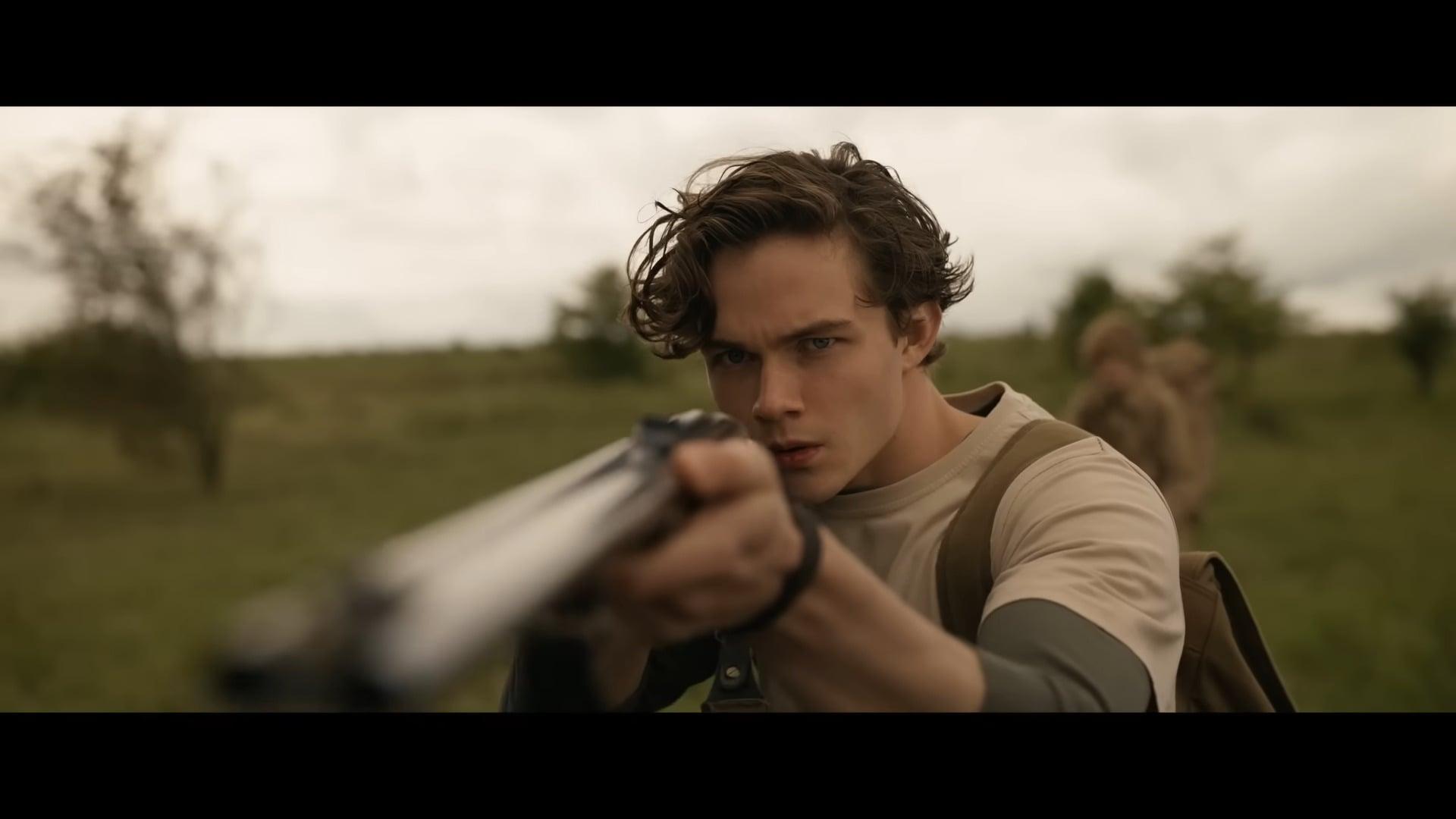 A young Kraven (Levi Miller) takes aim in Kraven the Hunter (2023), Sony Pictures