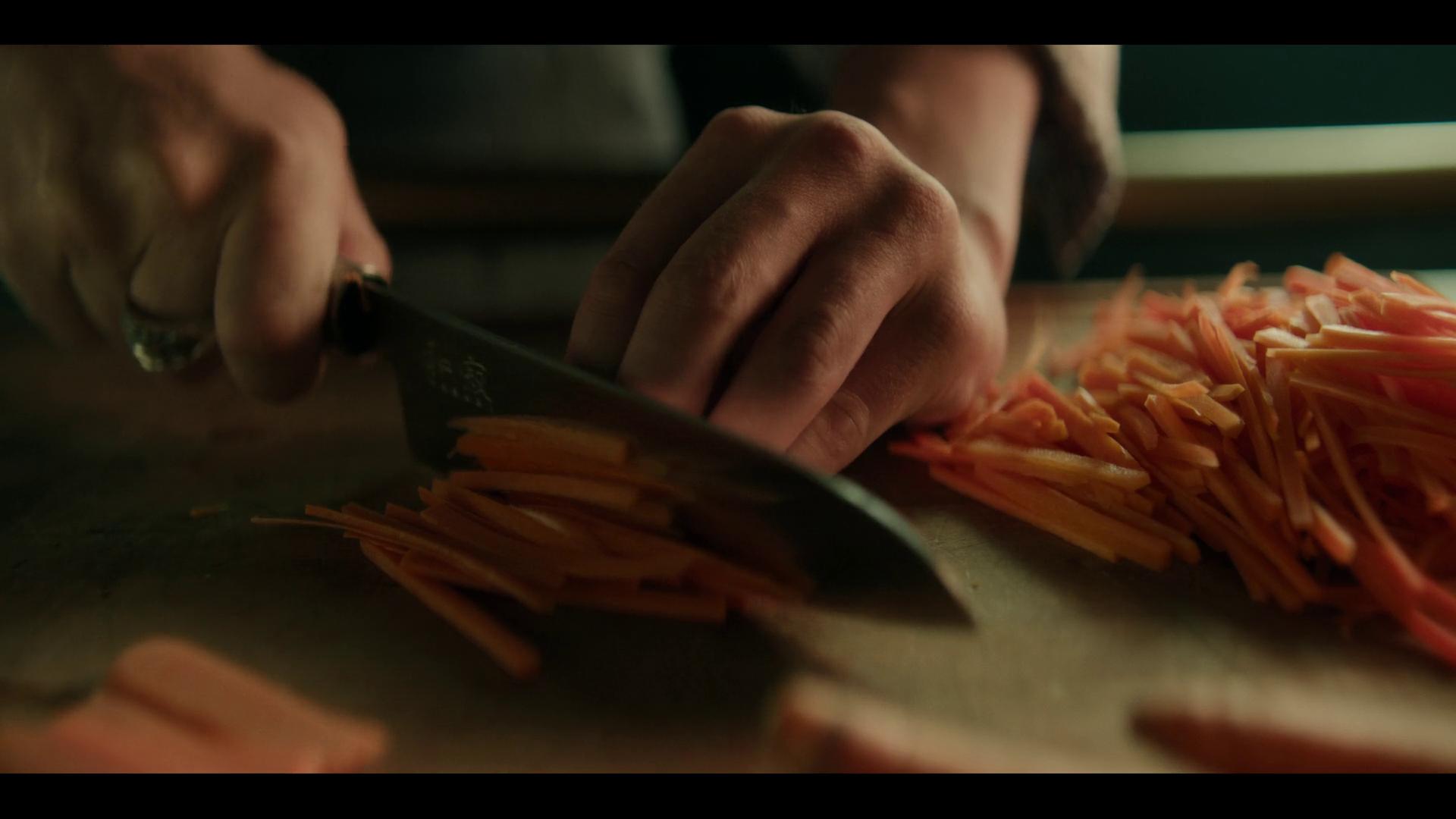 Sanji (Taz Skylar) 'chops' some carrots in One Piece Season 1 Episode 6 "The Chef and the Chore Boy" (2023), Netflix
