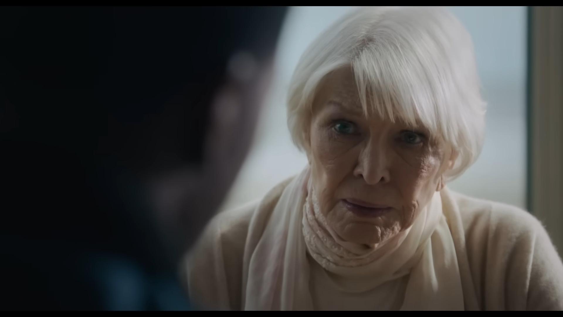 Chris MacNeil (Ellen Burstyn) opines to Victor Fielding (Leslie Odom Jr.) about why she was not allowed to see Regan's (Linda Blair) exorcism in The Exorcist: Believer (2023), Universal Pictures