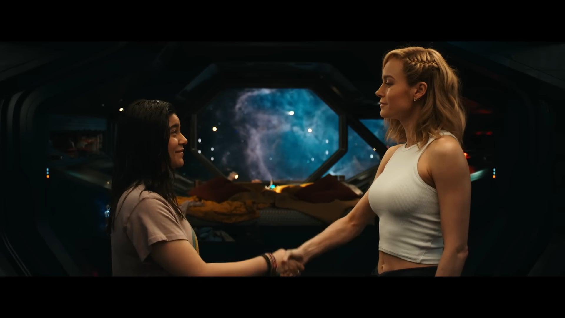 Ms. Marvel (Iman Vellani) formally introduces herself to her hero Captain Marvel (Carol Danvers) in The Marvels (2023), Marvel Entertainment