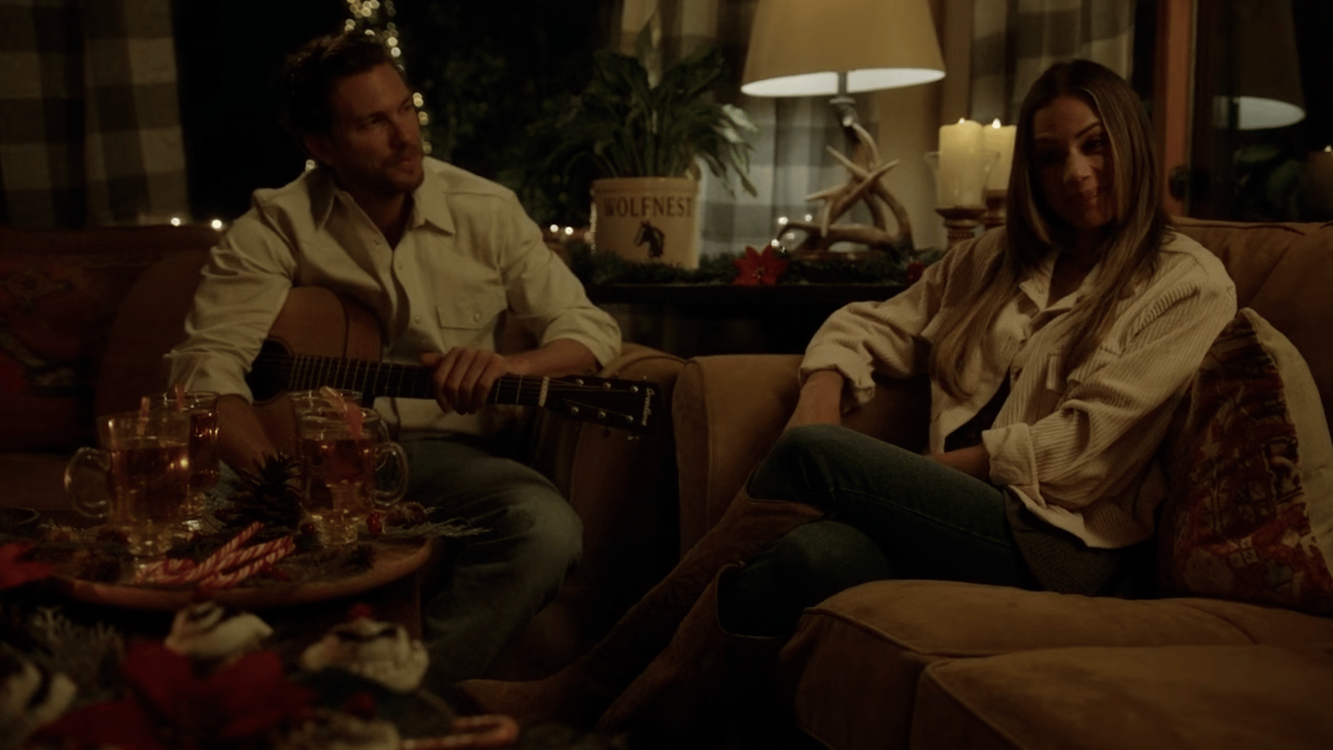 Jana Kramer as Lexie Crenshaw and Adam Senn as Coby Mason in A Cowboy Christmas Romance (2023), Lifetime
