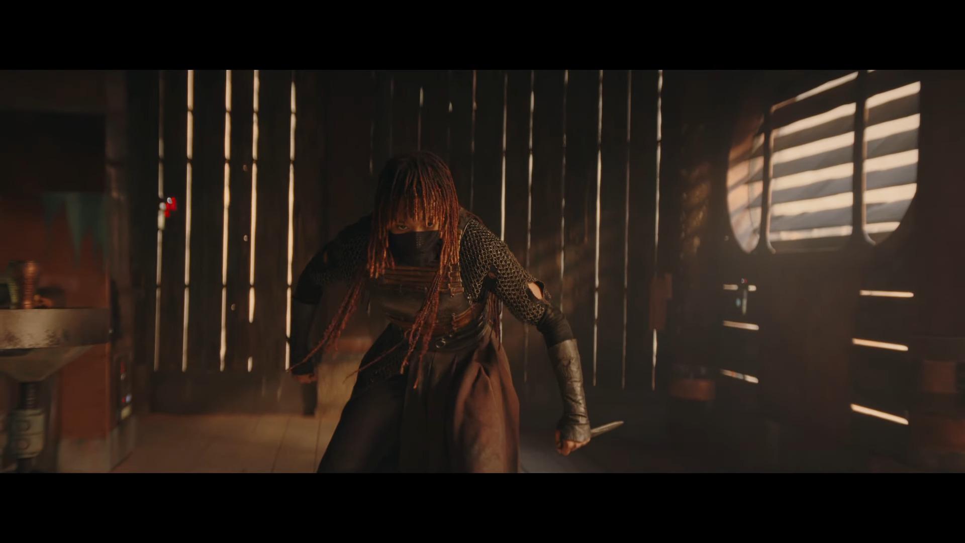 A Sith (Amandla Stenberg) steadies herself against Master Indara (Carrie-Anne Moss) in The Acolyte (2024), Disney