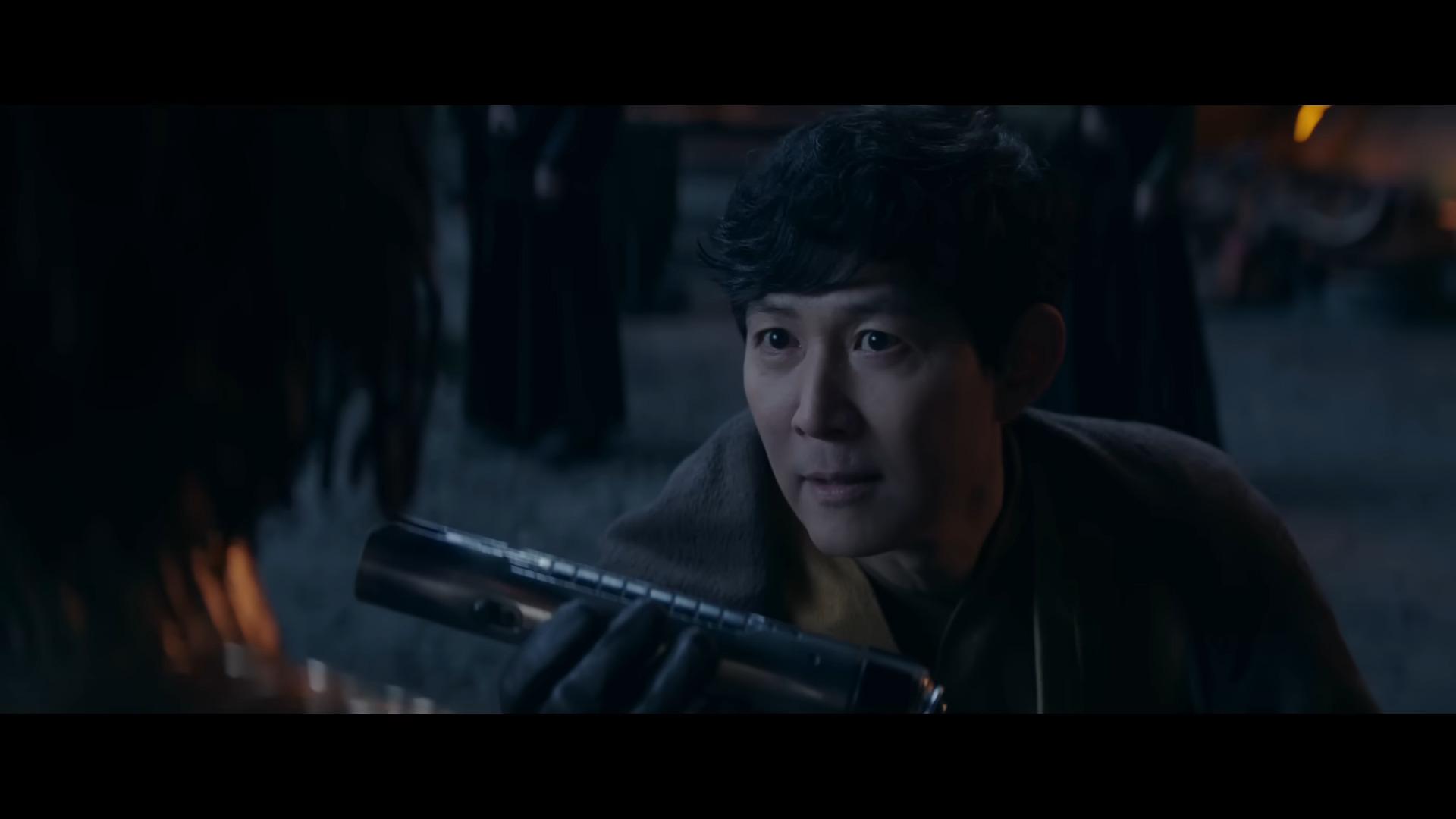 Sol (Lee Jung-jae) gives Mae (Amandla Stenberg) her first glimpse of a lightsaber in The Acolyte (2024), Disney