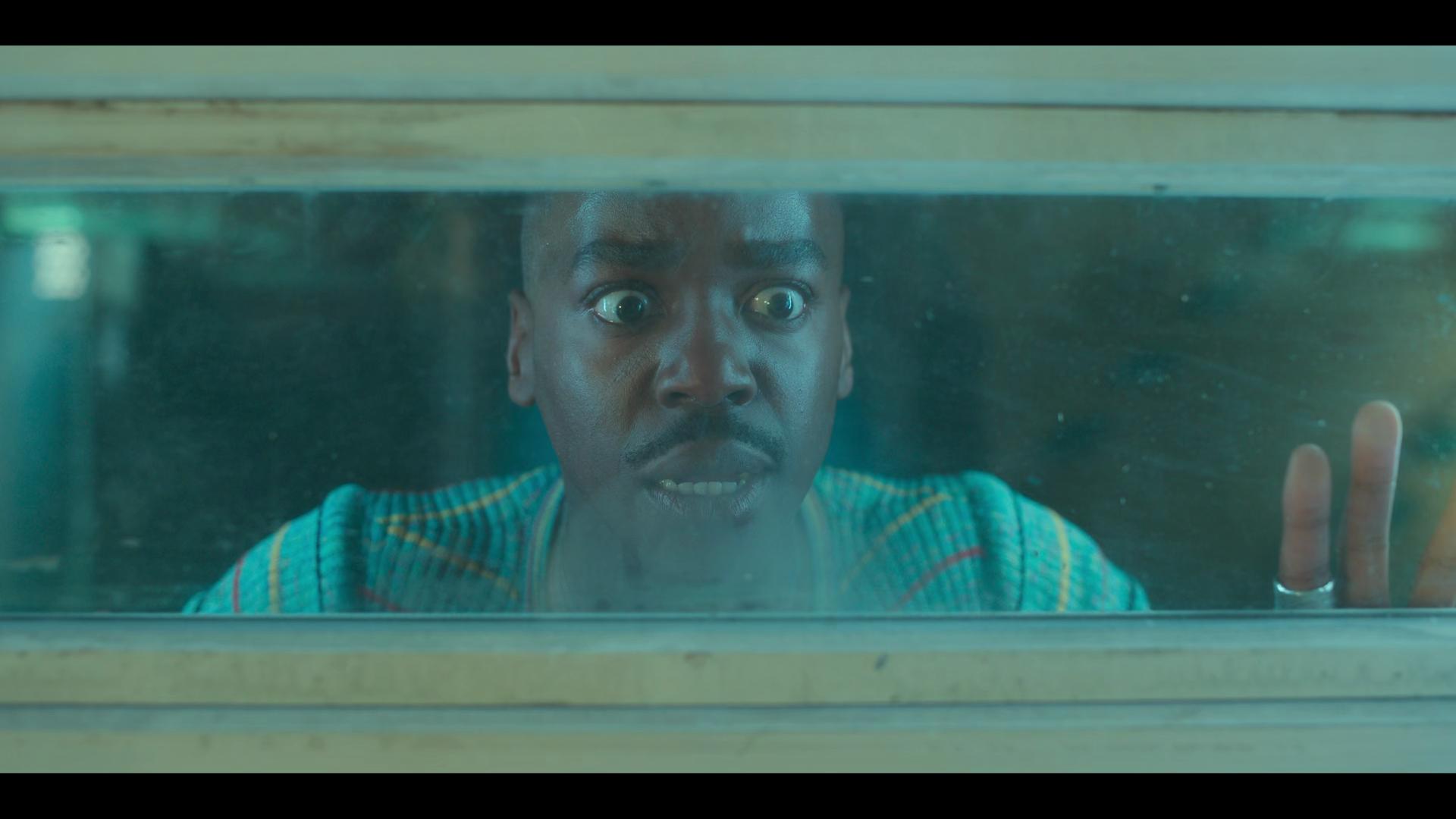The Doctor (Ncuti Gatwa) watches on as the Bogeyman (Robert Strange) meets its end in Doctor Who Series 14 Episode 1 "Space Babies" (2024), BBC