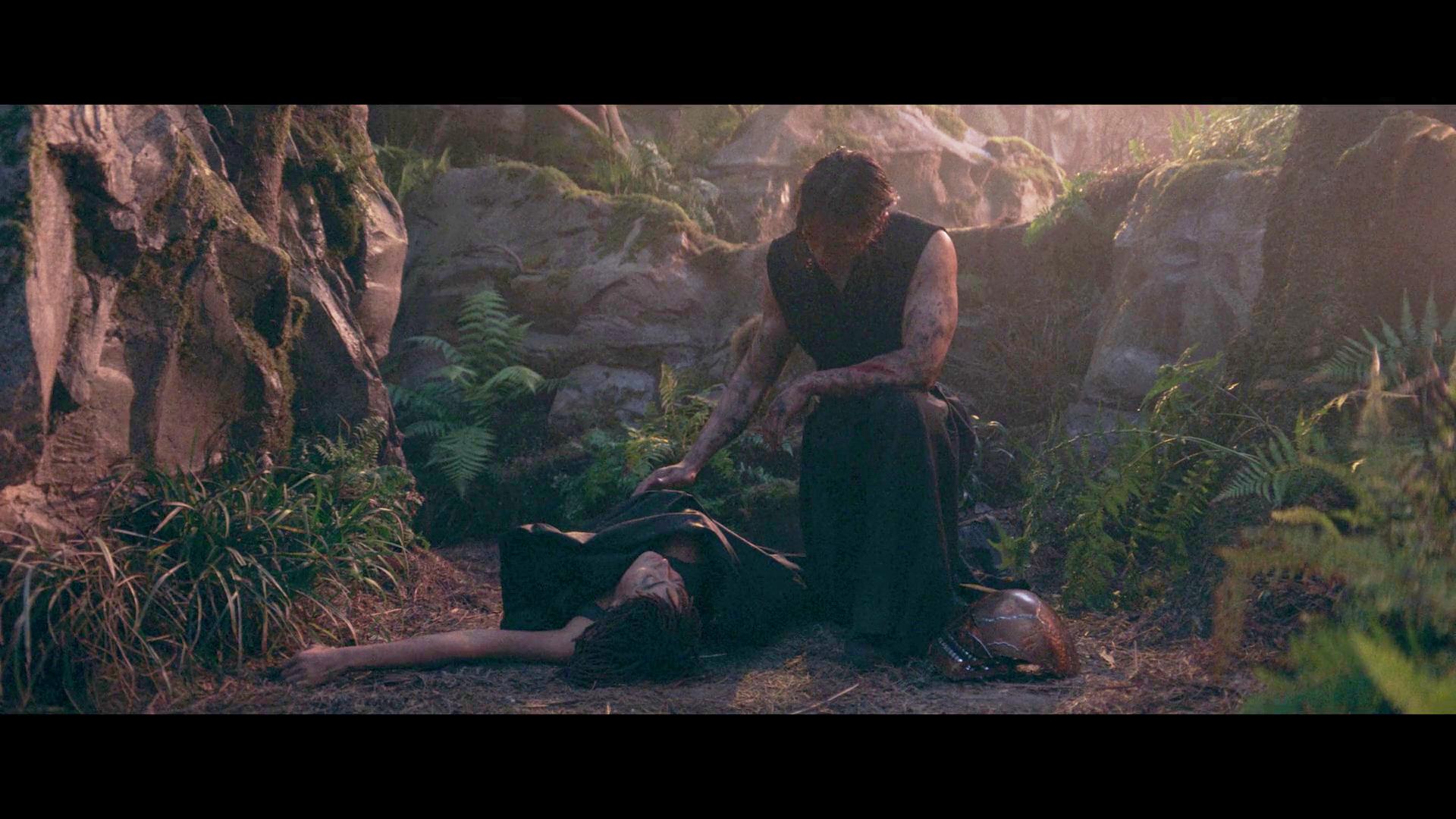 The Stranger (Manny Jacinto) watches over a wounded Osha (Amandla Stenberg) in The Acolyte Season 1 Episode 5 "Night" (2024), Disney