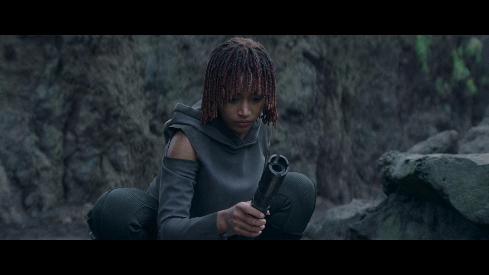 Osha (Amandla Stenberg) considers slaying Qimir (Manny Jacinto) with his own lightsaber in The Acolyte Season 1 Episode 6 'Teach/Corrupt' (2024), Disney