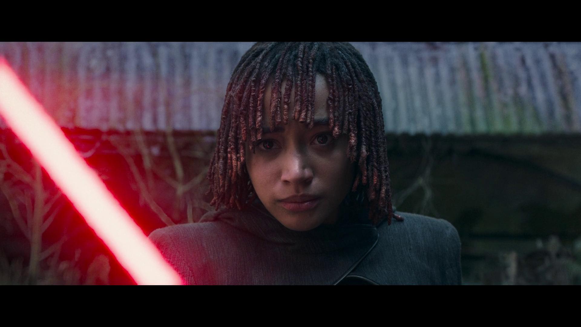 Osha (Amandla Stenberg) wields Master Sol's (Lee Jung-jae) now-red lightsaber in The Acolyte Season 1 Episode 8 "The Acolyte" (2024), Disney