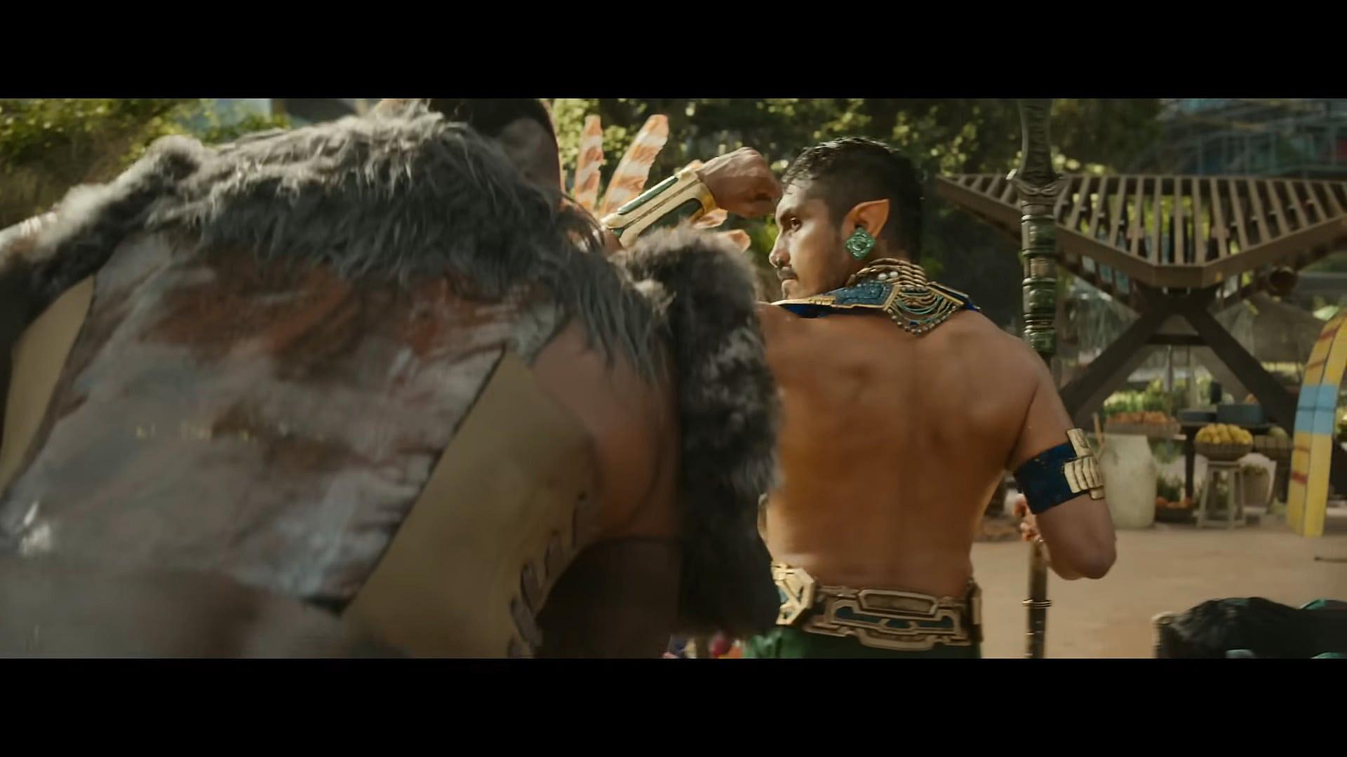Namor (Tenoch Huerta) blocks blow from M'Baku (Winston Duke) in Black Panther: Wakanda Forever