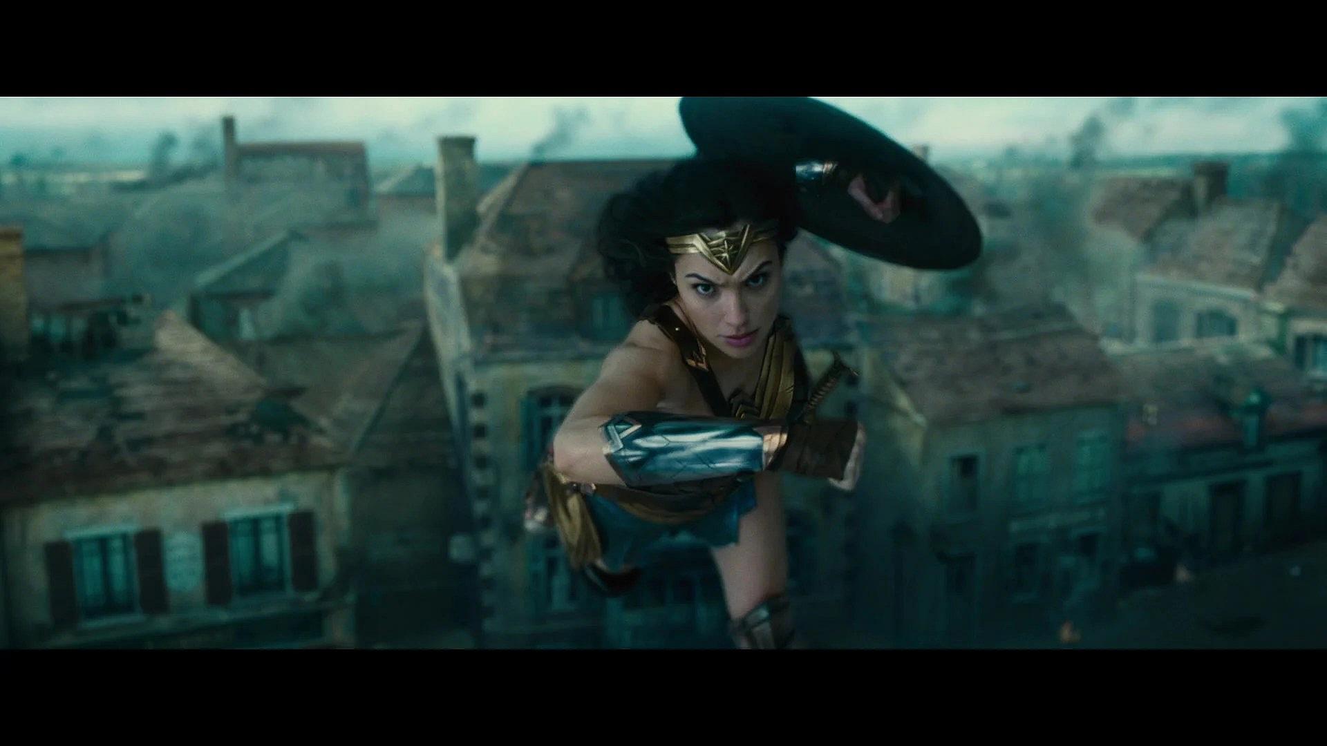 Diana leaps to take out an enemy soldier in Wonder Woman (2017), Warner Bros. Pictures