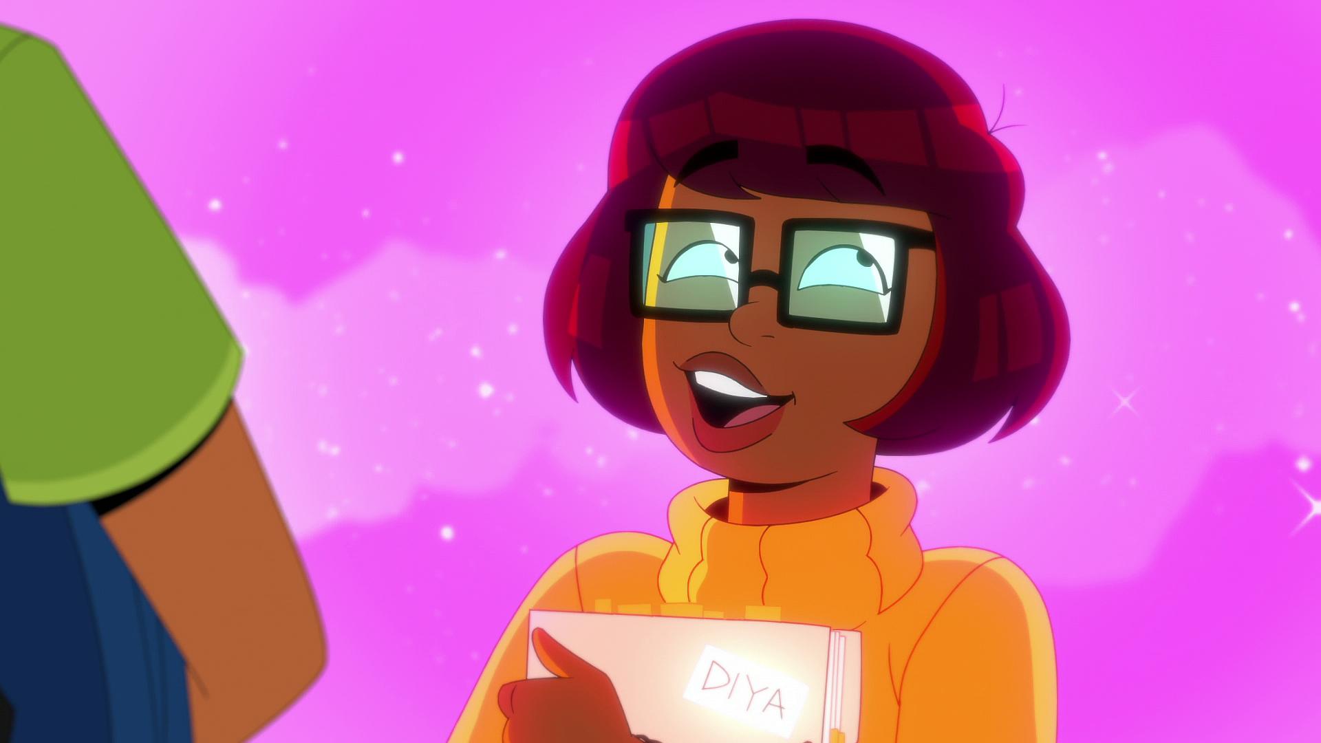 Velma (Mindy Kaling) tries to play off her feelings for Daphne (Constance Wu) in Velma Season 1 Episode 2 "The Candy (Wo)Man" (2023), HBO Max