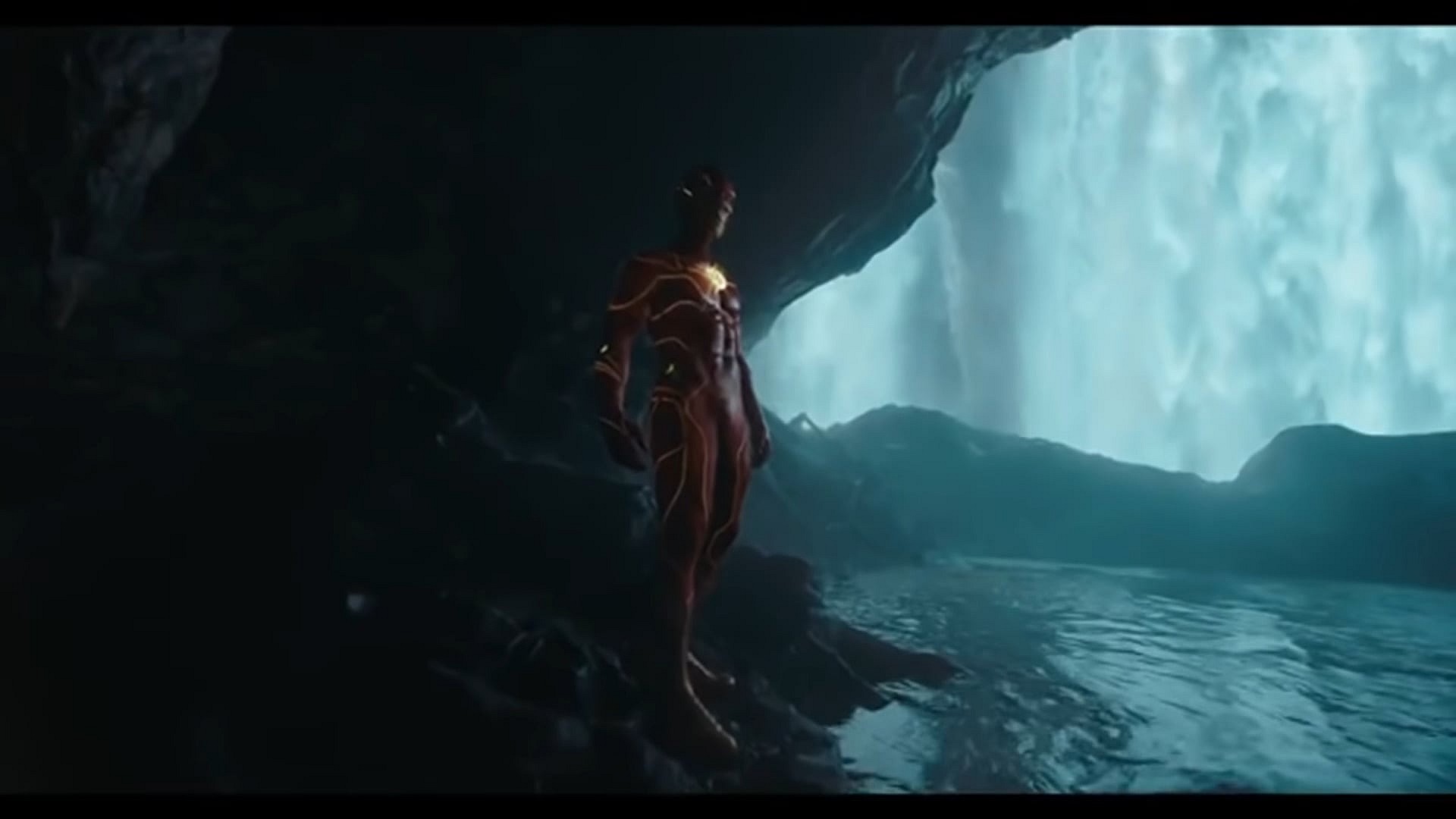 Barry Allen (Ezra Miller) dons his upgraded suit in The Flash (2023), Warner Bros. Pictures