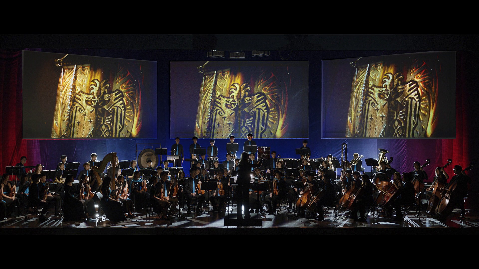 Lydia Tár (Cate Blanchett) prepares to conduct a Monster Hunter-themed performance via Tár (2022), Universal Pictures