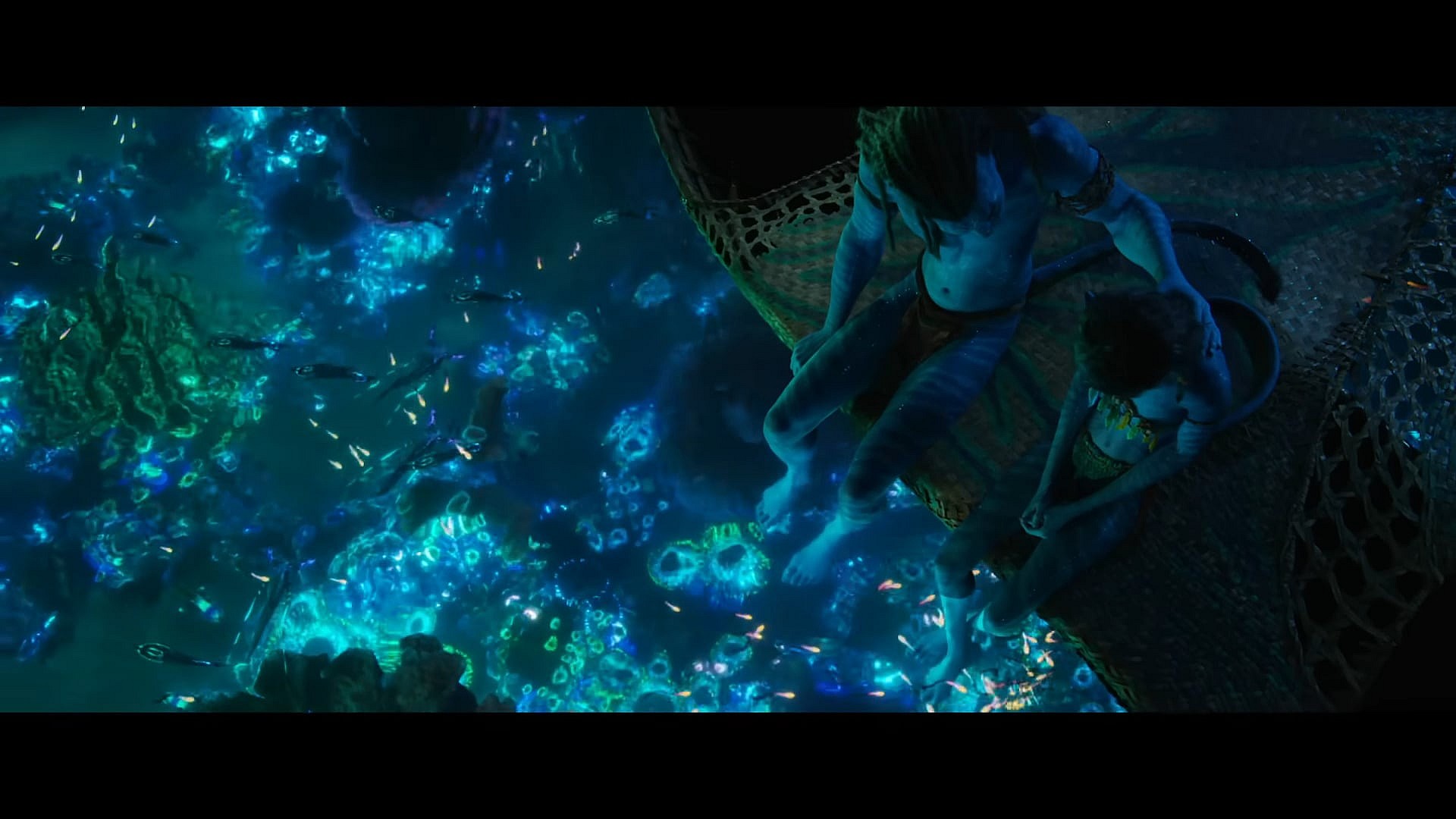 Jake Sully (Sam Worthington) gives advice to his daughter Kiri (Sigourney Weaver) in Avatar: The Way of Water (2022), Disney via YouTube