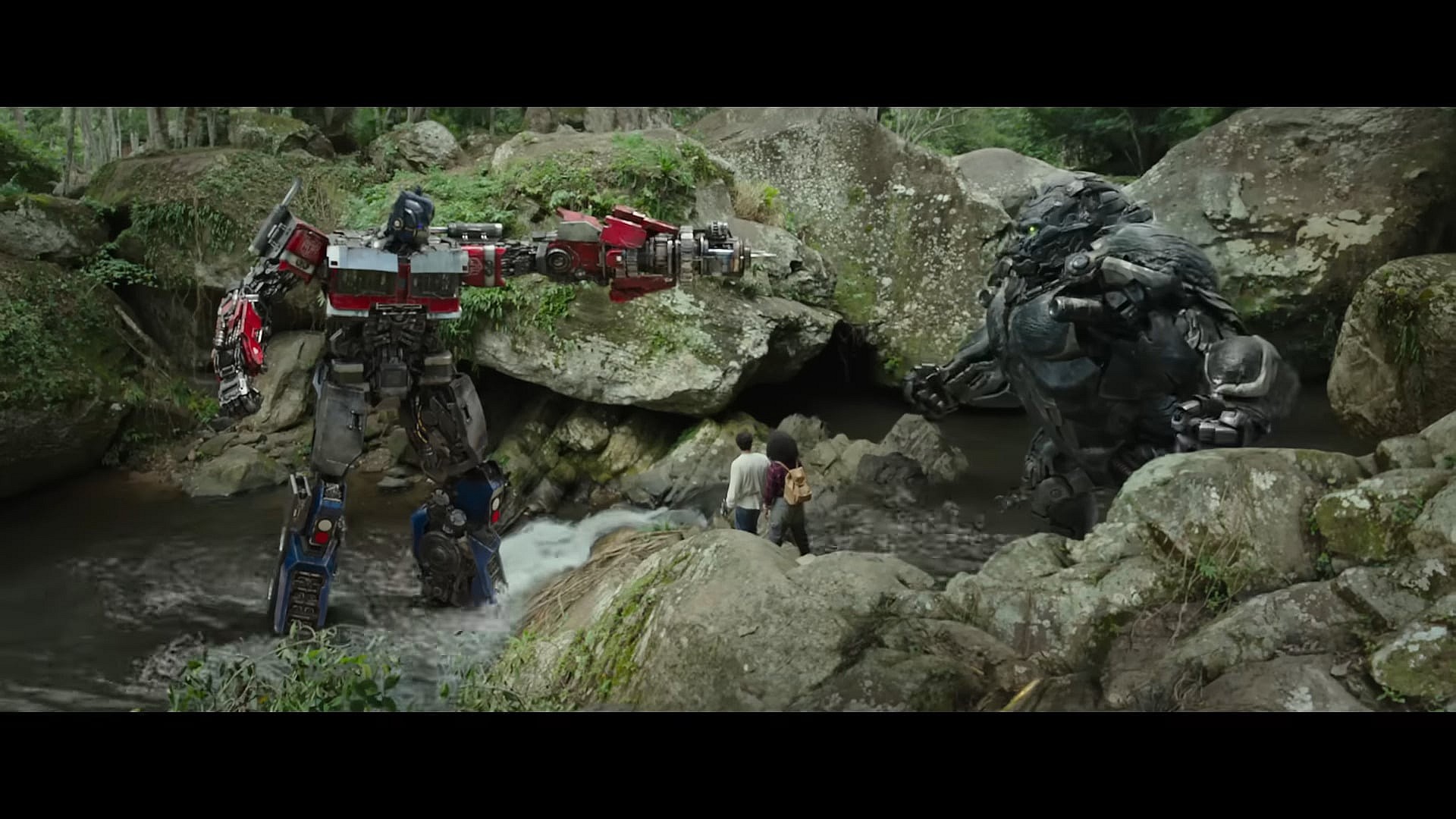 Optimus Prime (Peter Cullen) comes face-to-face with Optimus Primal (Ron Perlman) in Transformers: Rise of the Beasts (2023), Paramount Pictures via YouTube