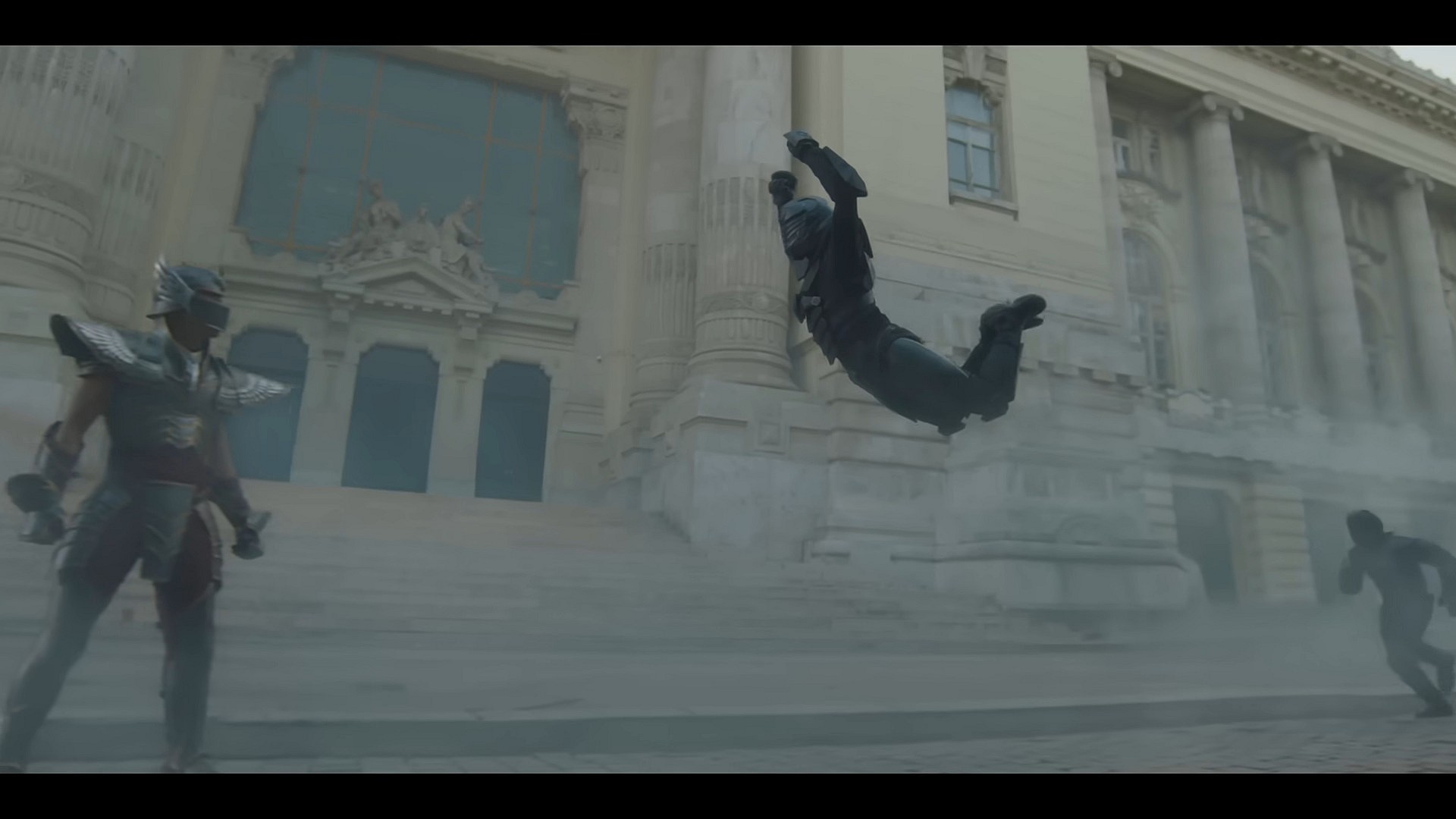 One of Phoenix Nero's (Diego Tinoco) Black Knights leaps out to attack Seiya (Mackenyu) in Knights of the Zodiac (2023), Toei Animation via YouTube