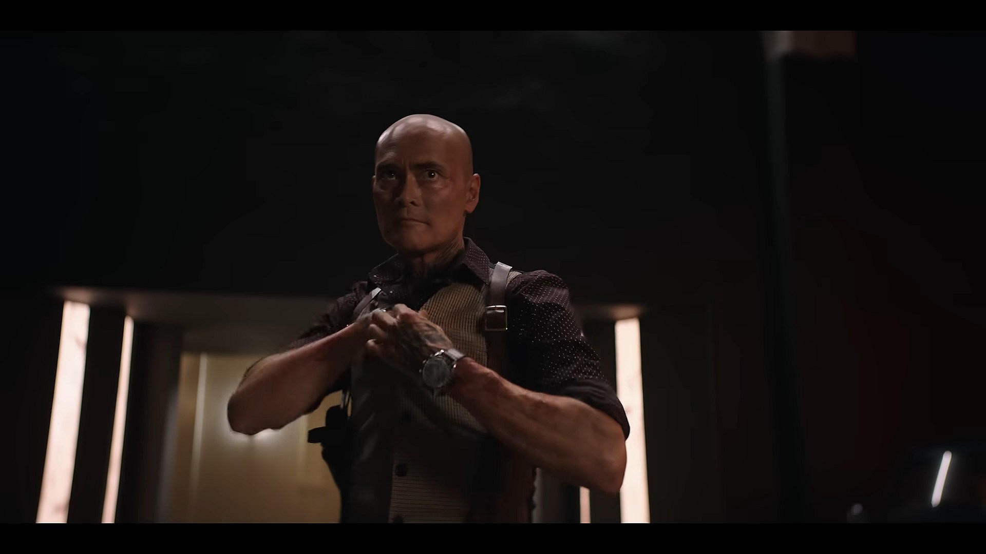 Tatsumi (Mark Dacascos) readies himself for a fight in Knights of the Zodiac (2023), Toei Animation via YouTube 