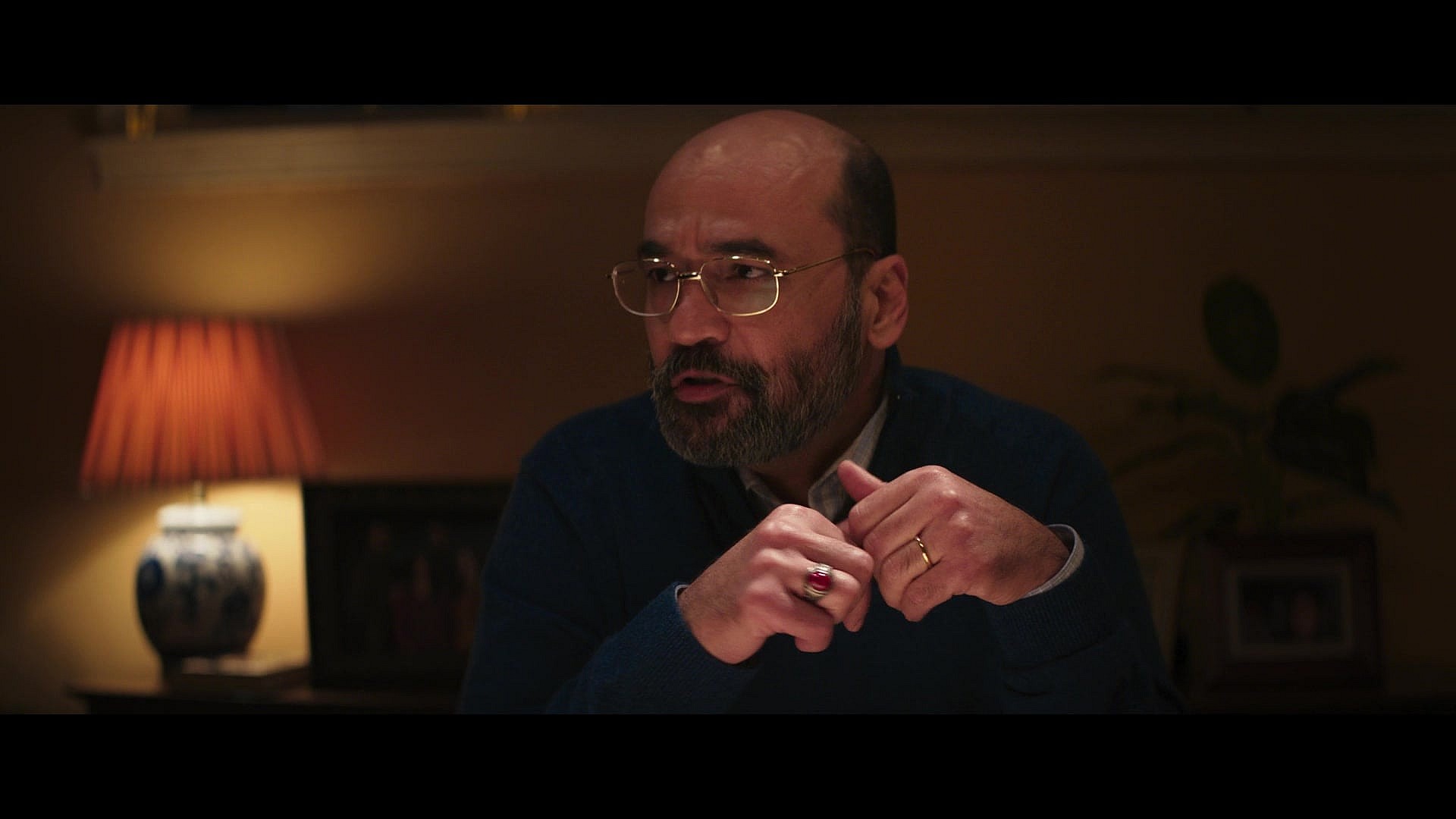 Yusuf Khan (Mohan Kapur) speaks to his family around the dinner table in Ms. Marvel Season 1 Episode 2 "Crushed" (2022), Marvel Entertainment via Disney Plus