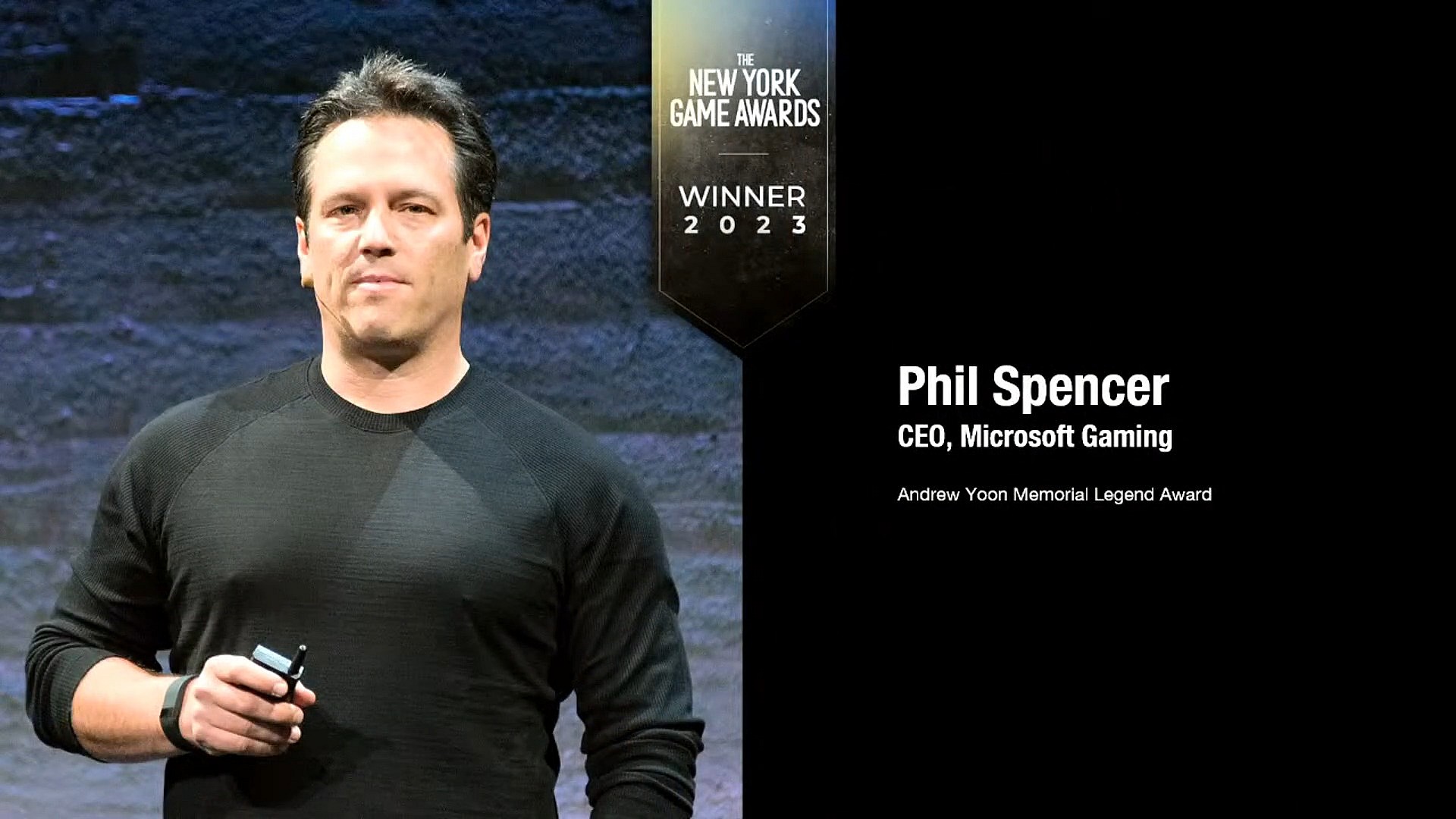 Xbox head Phil Spencer receives the 2022 New York Game Awards' Andrew Yoon Memorial Legend Award
