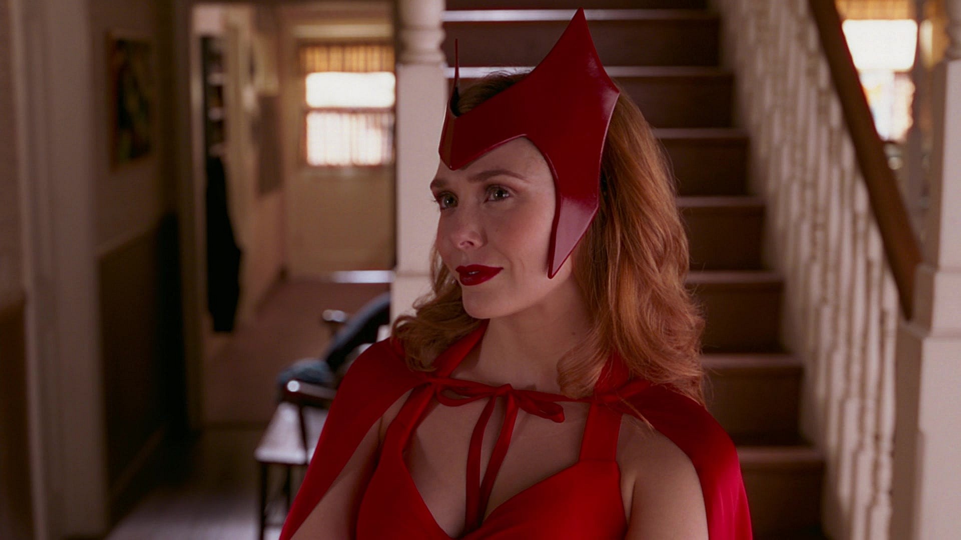 Wanda Maximoff (Elizabeth Olsen) dons her classic comic book costume in WandaVision Season 1 Episode 6 "All-New Halloween Spooktacular!" (2021), Marvel Entertainment