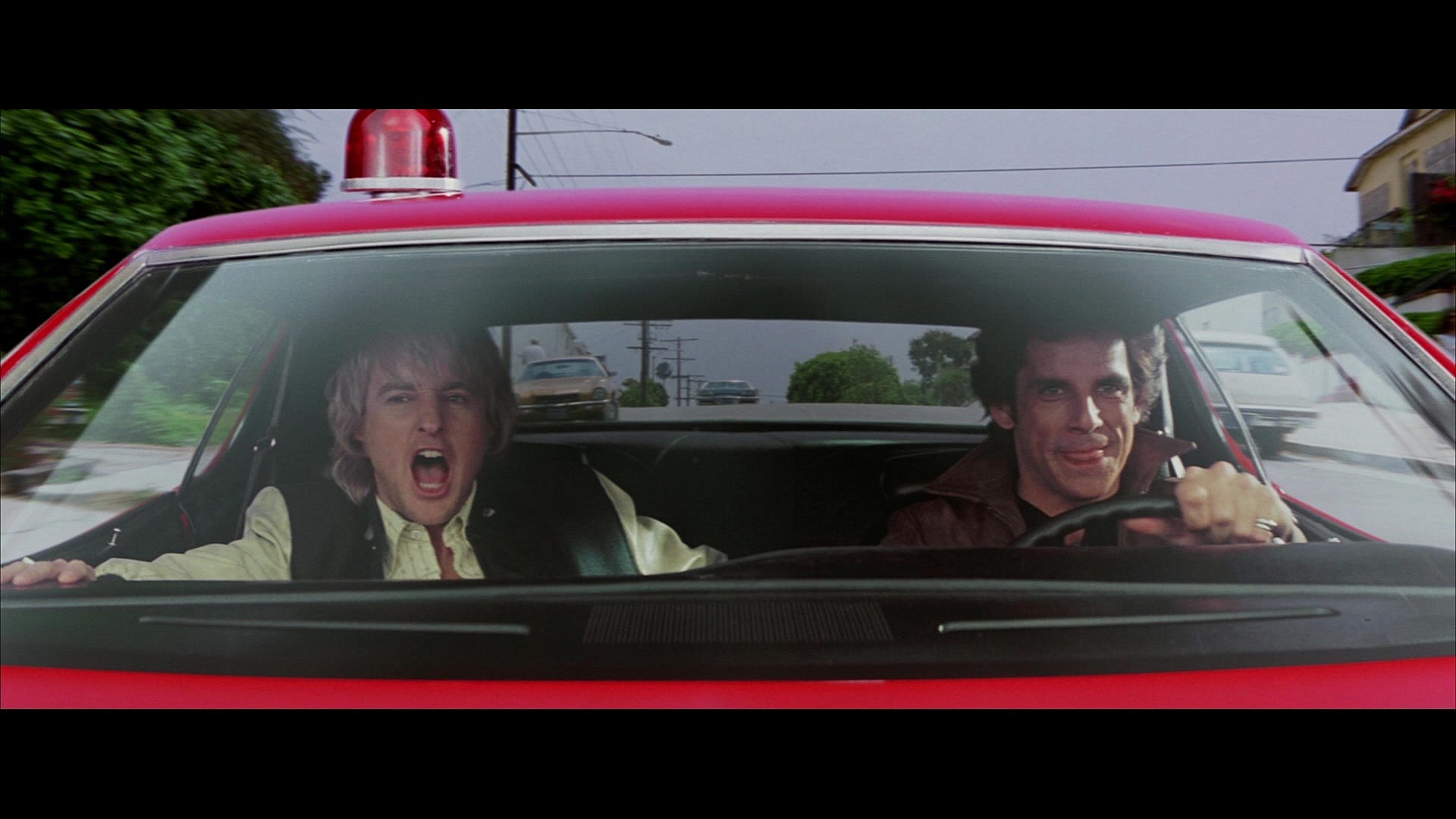 Starsky (Owen Wilson) and Hutch (Ben Stiller) take to the streets in Starsky & Hutch (2004), Warner Bros. Pictures