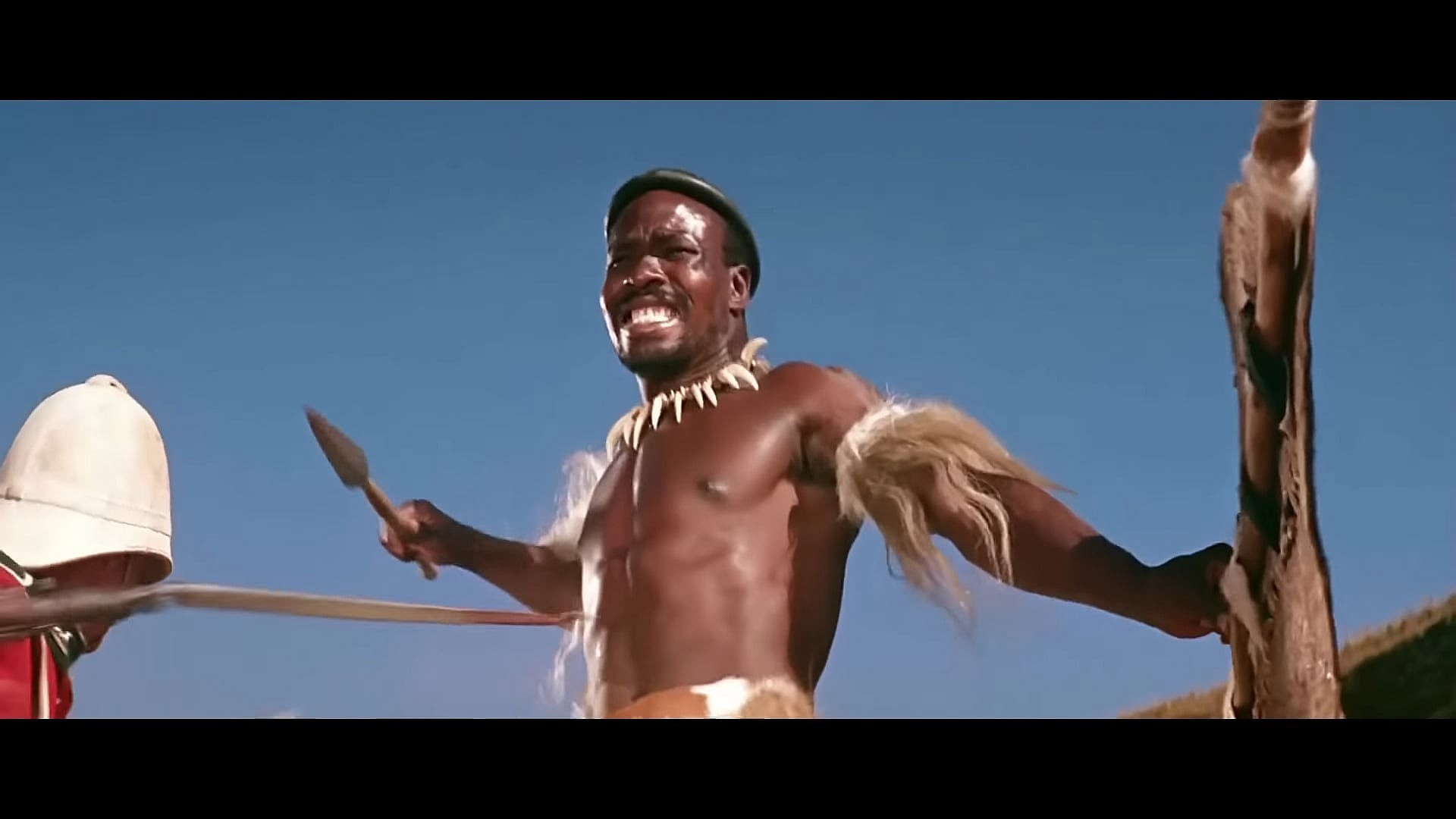 A Zulu warrior forces his way into the British Army's camp in Zulu (1964), Diamond Films