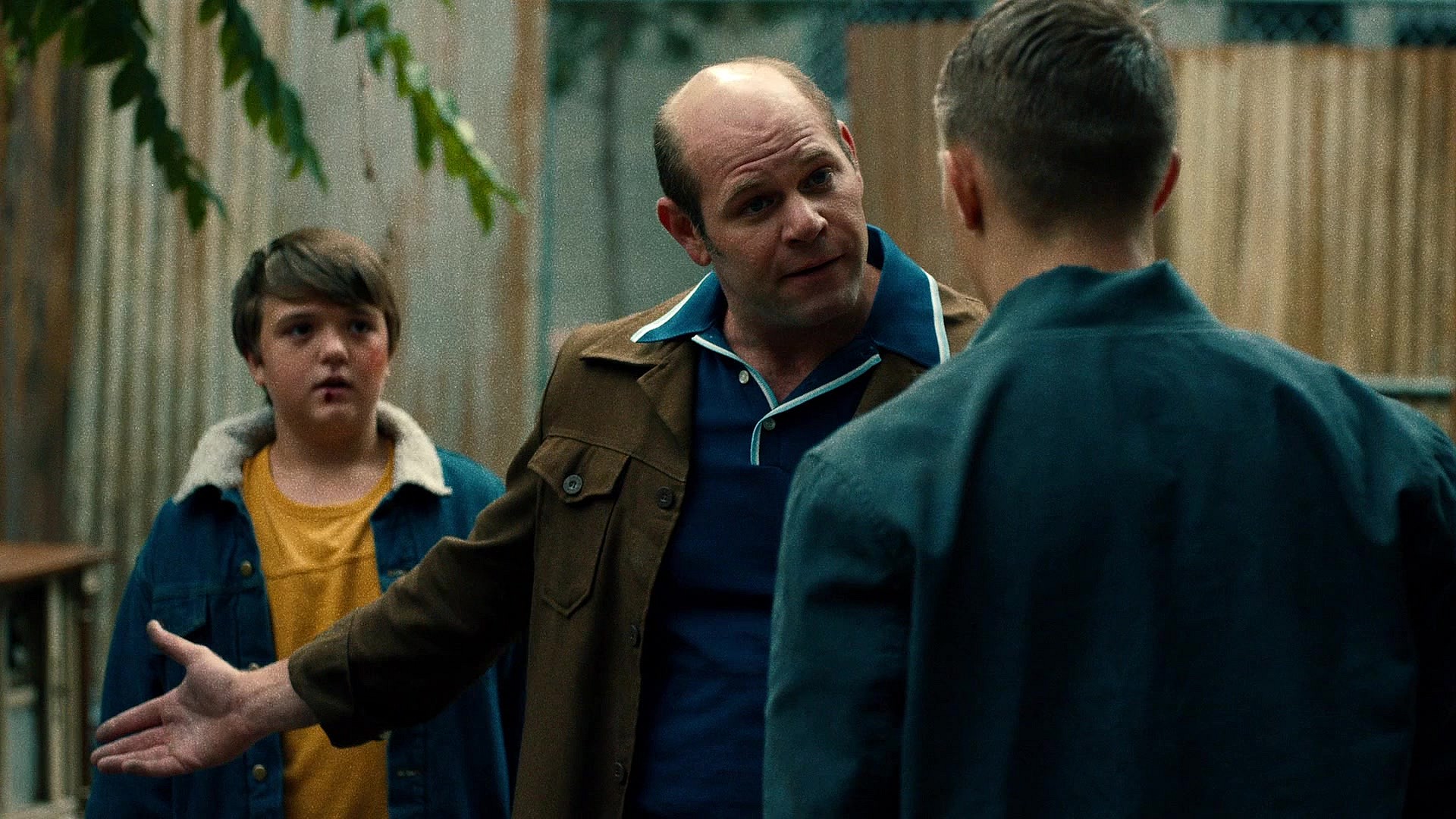 Bill Fisk (Domenick Lombardozzi) has words for Bernie Walker (Keenan Jolliff) on behalf of his son Wilson (Cole Jensen) in Daredevil Season 1 Episode 8 "Shadows in the Glass" (2015), Marvel Entertainment