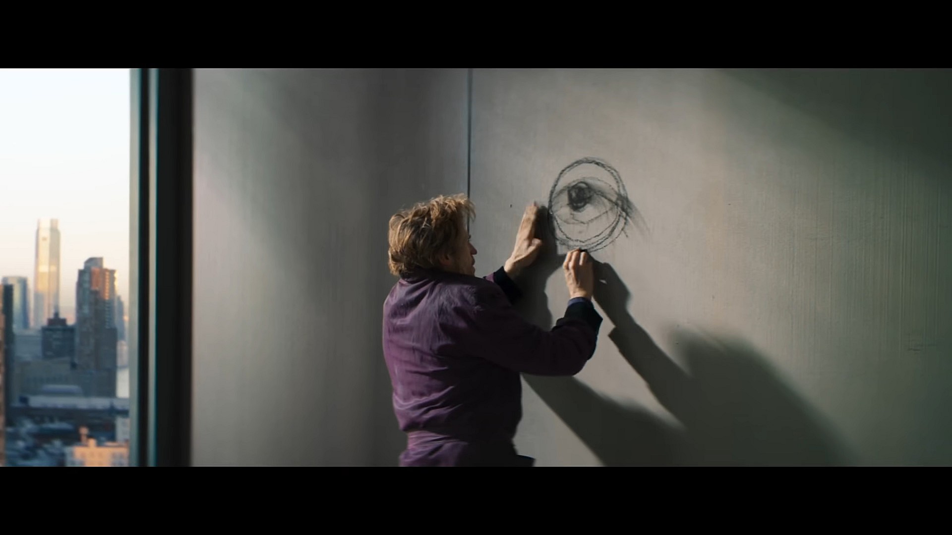 Nemo (Willem Dafoe) doodles on the walls in Inside (2023), Focus Features