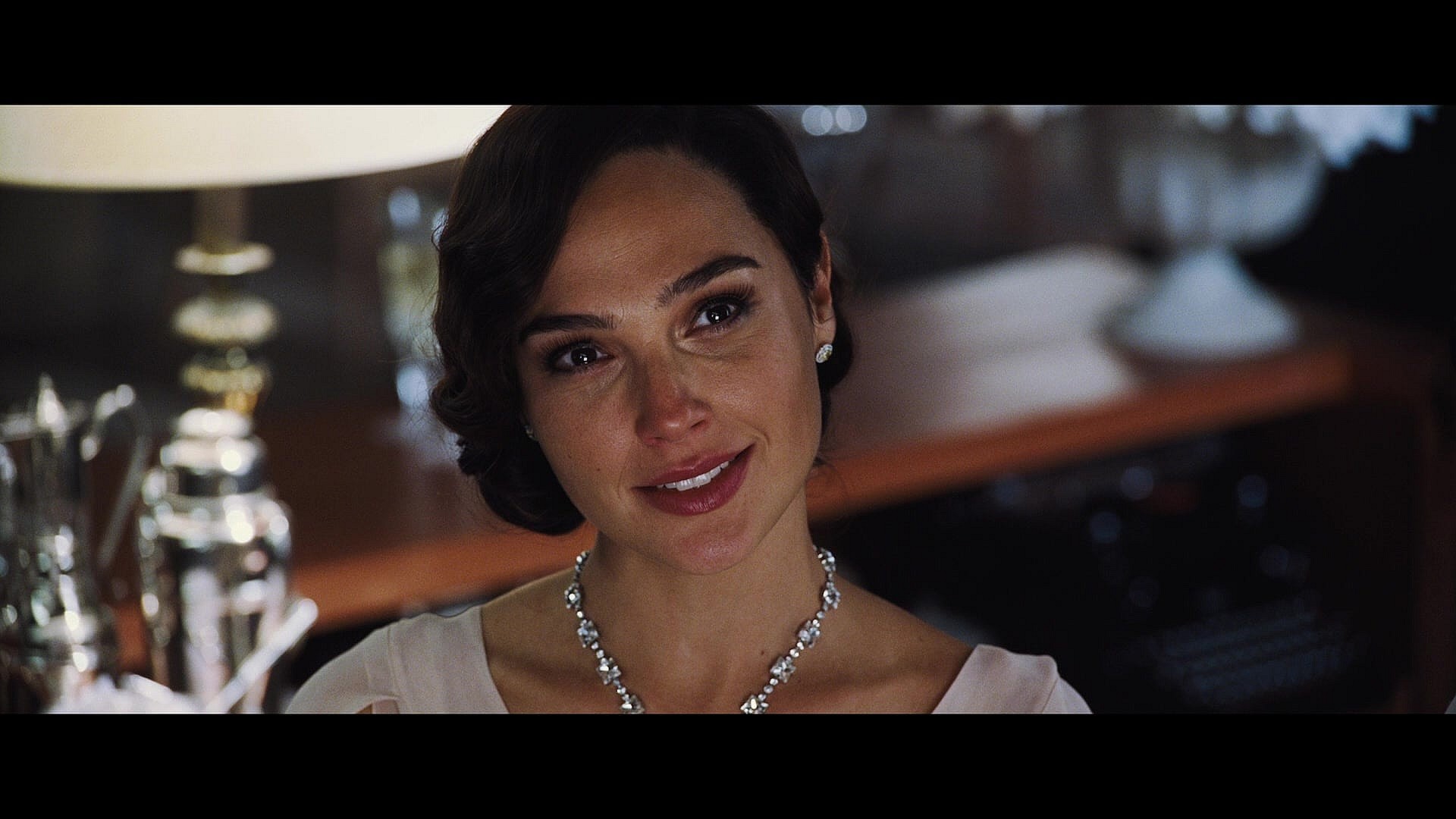 Linny Rideway-Doyle (Gal Gadot) is asked for a dance by her husband Simon (Armie Hammer) in Death on the Nile (2022), 20th Century Studios 