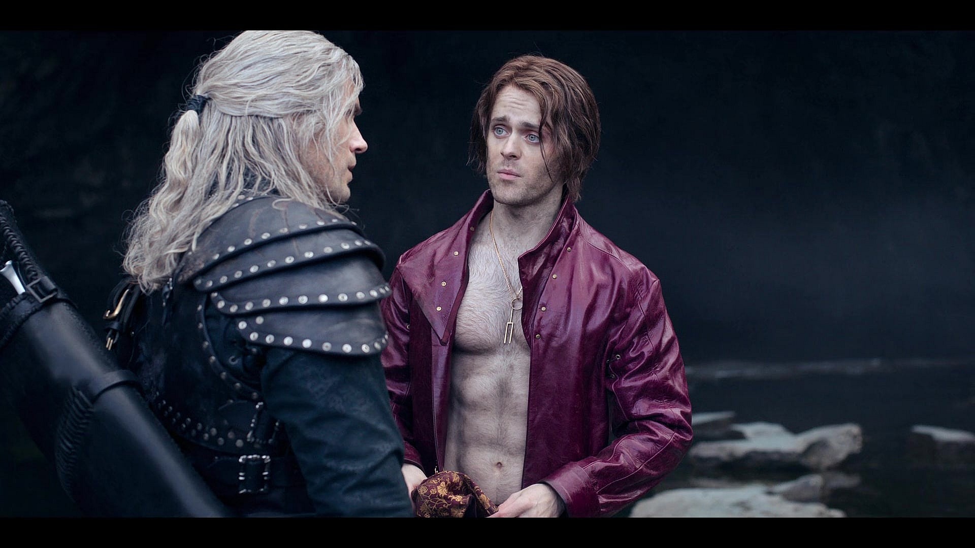 Jaskier (Joey Batsy) catches Geralt (Henry Cavill) up on his recent exploits in The Witcher Season 2 Episode 7 “Voleth Meir” (2021) via Netflix