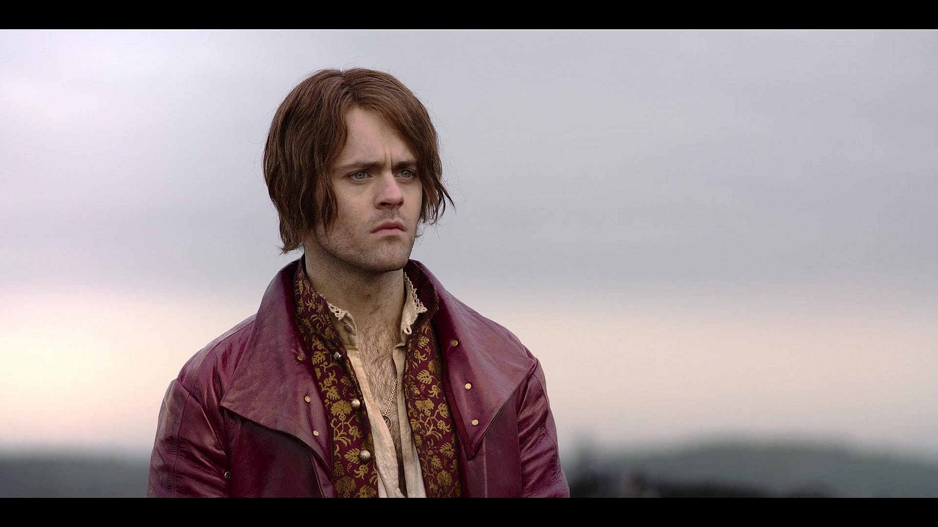 Jaskier (Joey Batsy) watches on as his companions find themselves at a crossroads in The Witcher Season 2 Episode 7 “Voleth Meir” (2021) via Netflix