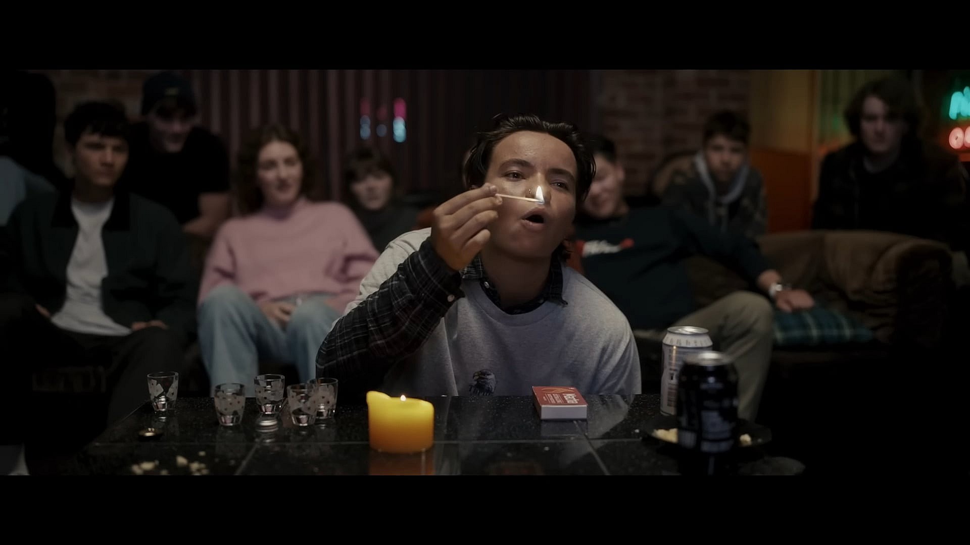 Hayley (Zoe Terakes) prepares a summoning ritual in Talk to Me (2023), A24