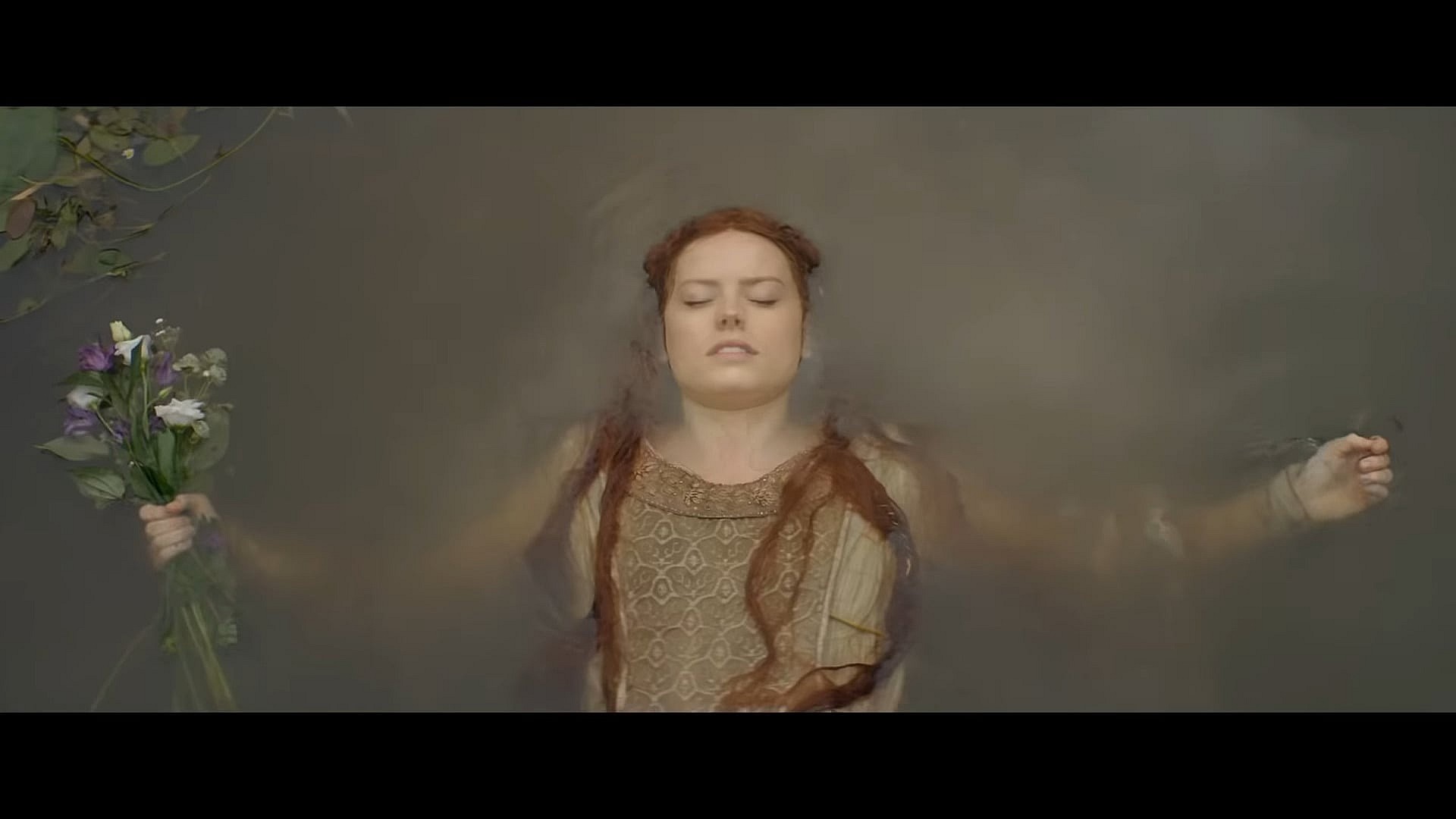Ophelia (Daisy Ridley) recreates John Everett Millais' titular 1852 painting in Ophelia (2018), Covert Media