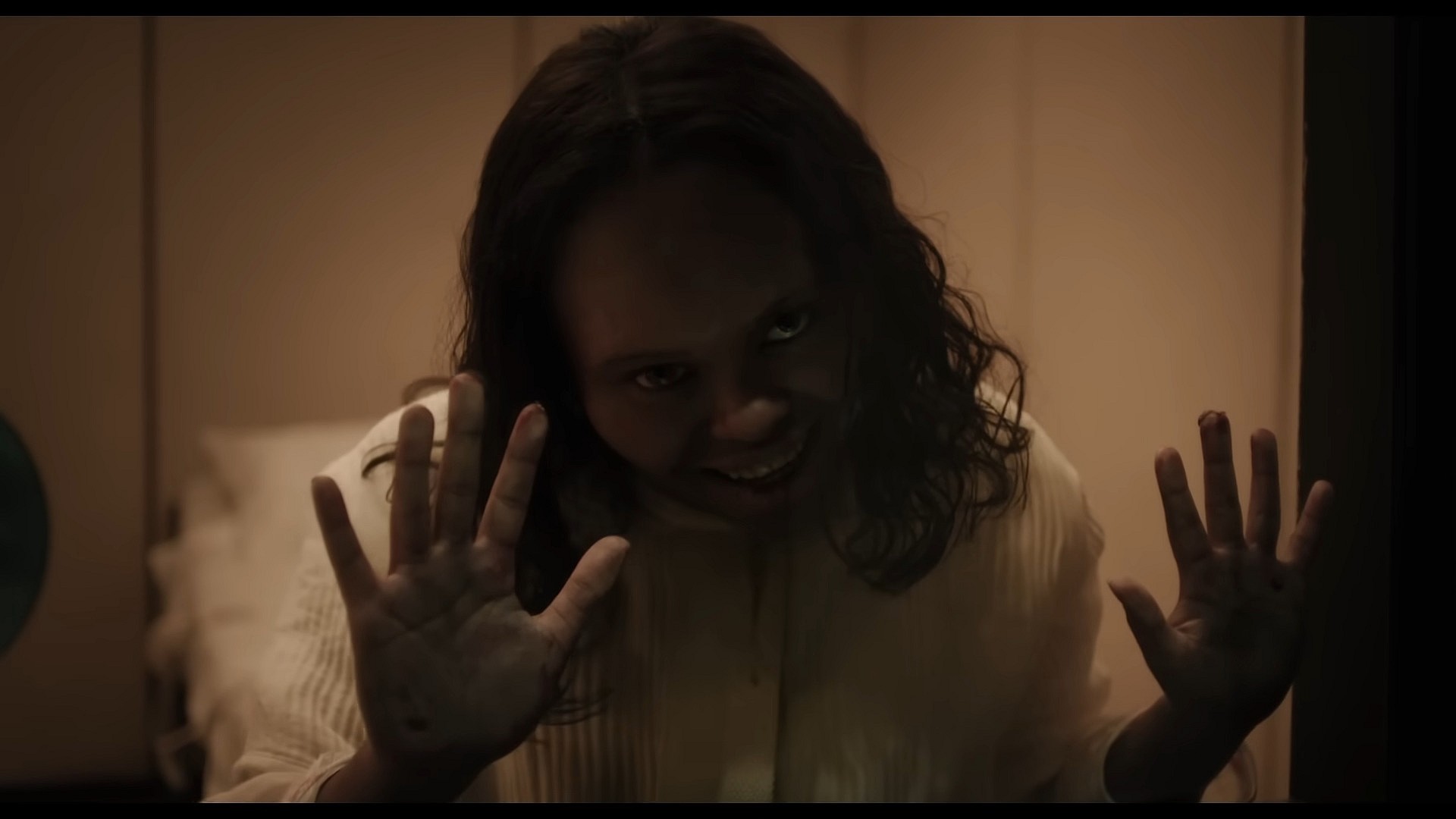 Angela (Lidya Jewett) finds herself in the swings of full possession in The Exorcist: Believer (2023), Universal Pictures