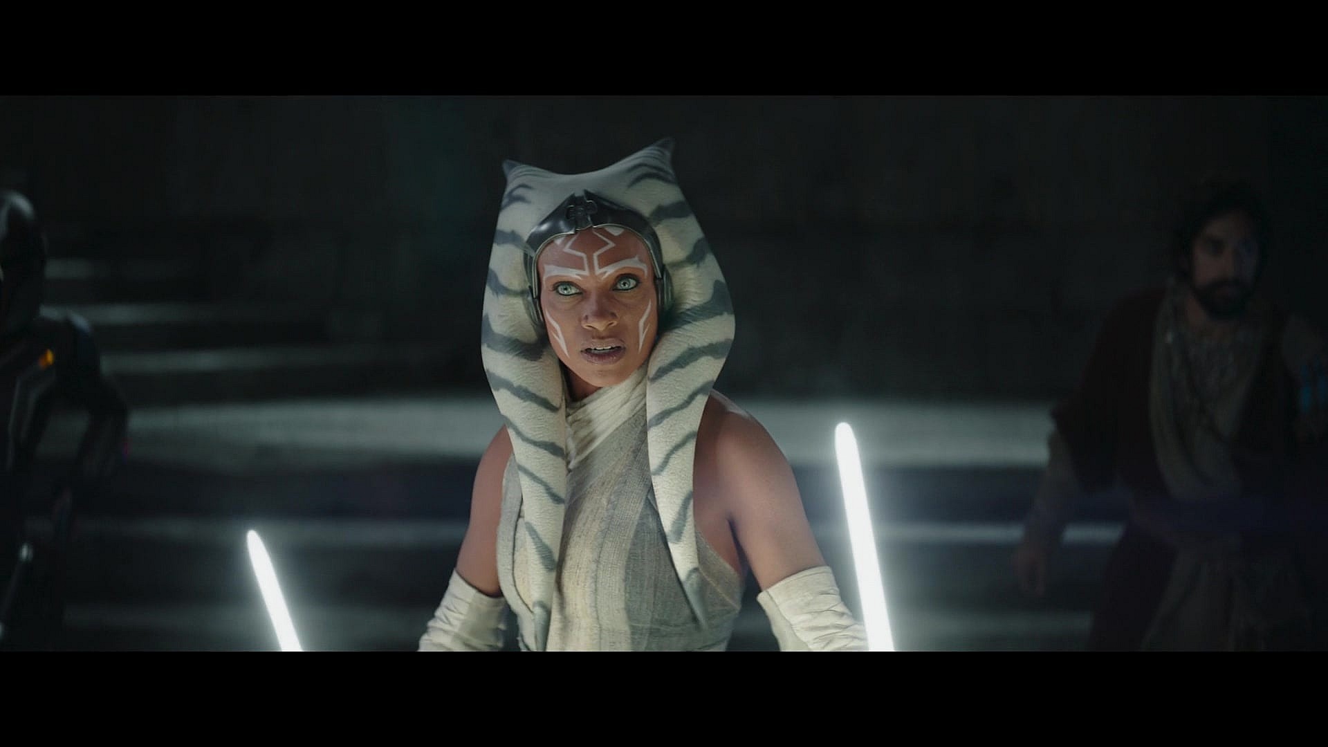 Ahsoka Tano (Rosario Dawson) prepares to face down Grand Admiral Thrawn's (Lars Mikkelsen) troops in Ahsoka Season 1 Episode 8 "Part Eight: The Jedi, the Witch, and the Warlord" (2023), Disney