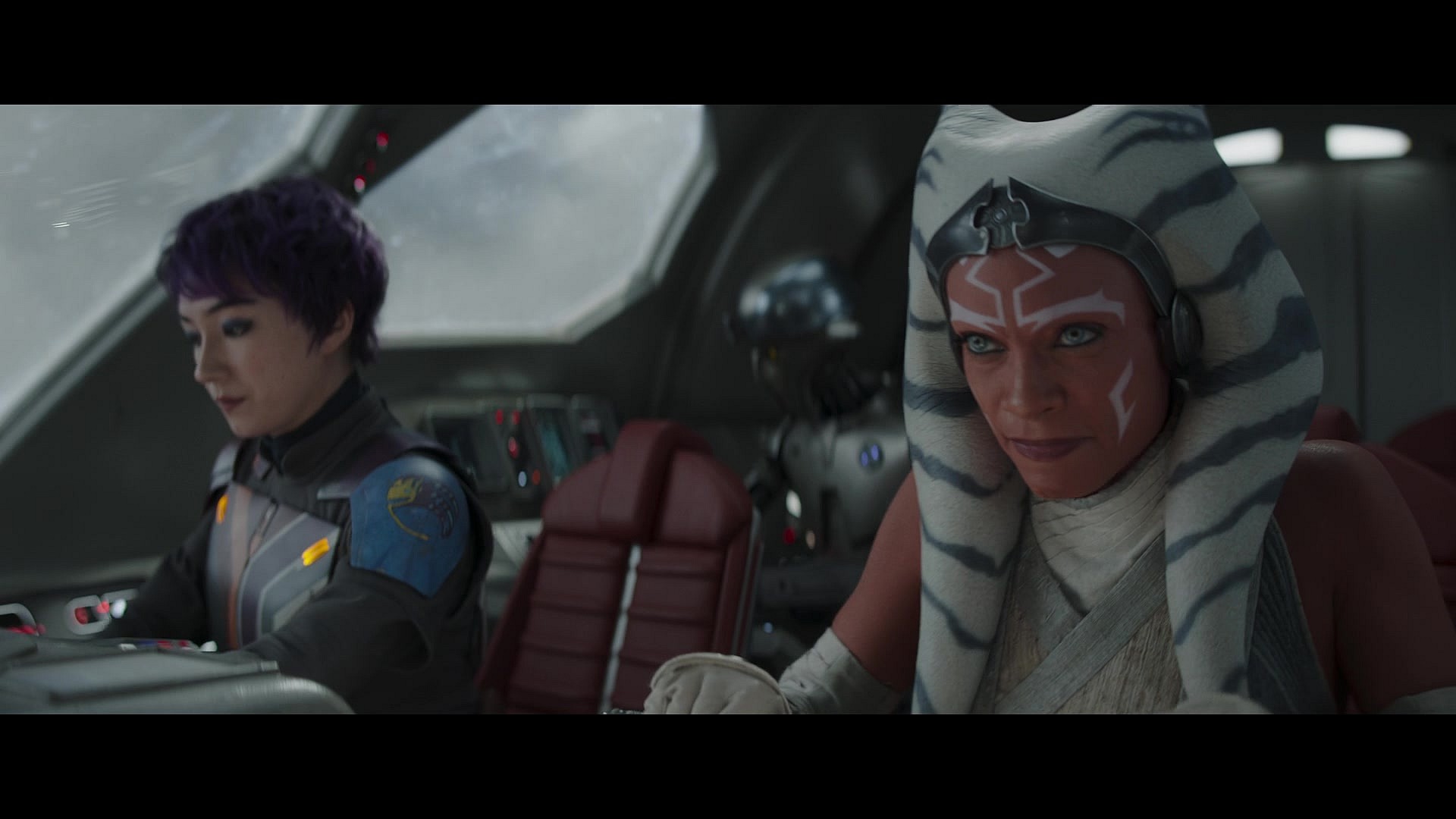 Ahsoka Tano (Rosario Dawson) and Sabine (Natasha Liu Bordizzo) accept that they're now trapped in a different galaxy in Ahsoka Season 1 Episode 8 "Part Eight: The Jedi, the Witch, and the Warlord" (2023), Disney