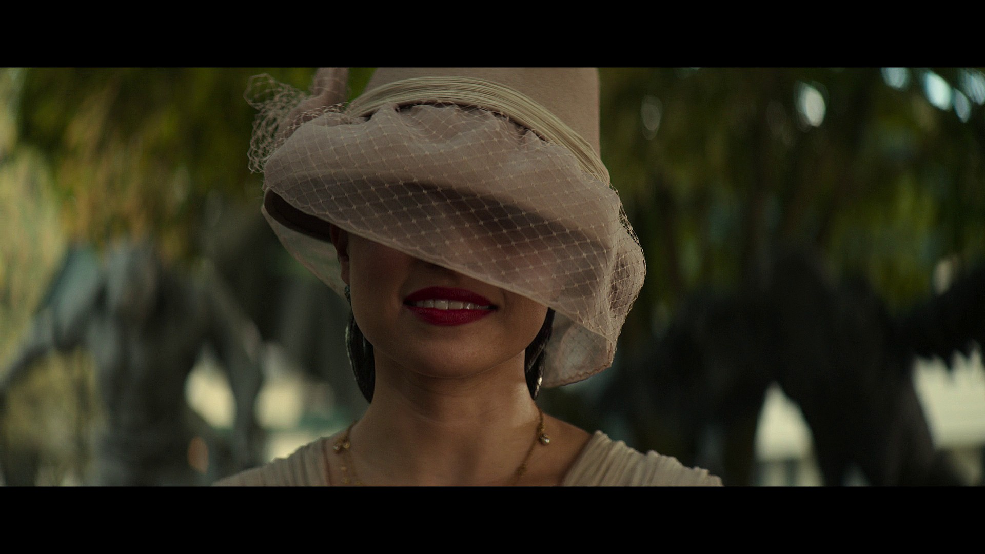 Medusa (Jessica Parker Kennedy) saves Percy (Walker Scobell), Grover (Aryan Simhadri), and Leah (Annabeth Chase) from the Harpy Alecto (Megan Mullaly) in Percy Jackson and The Olympians Season 1 Episode 3 "We Visit the Garden Gnome Emporium" (2023), Disney Plus