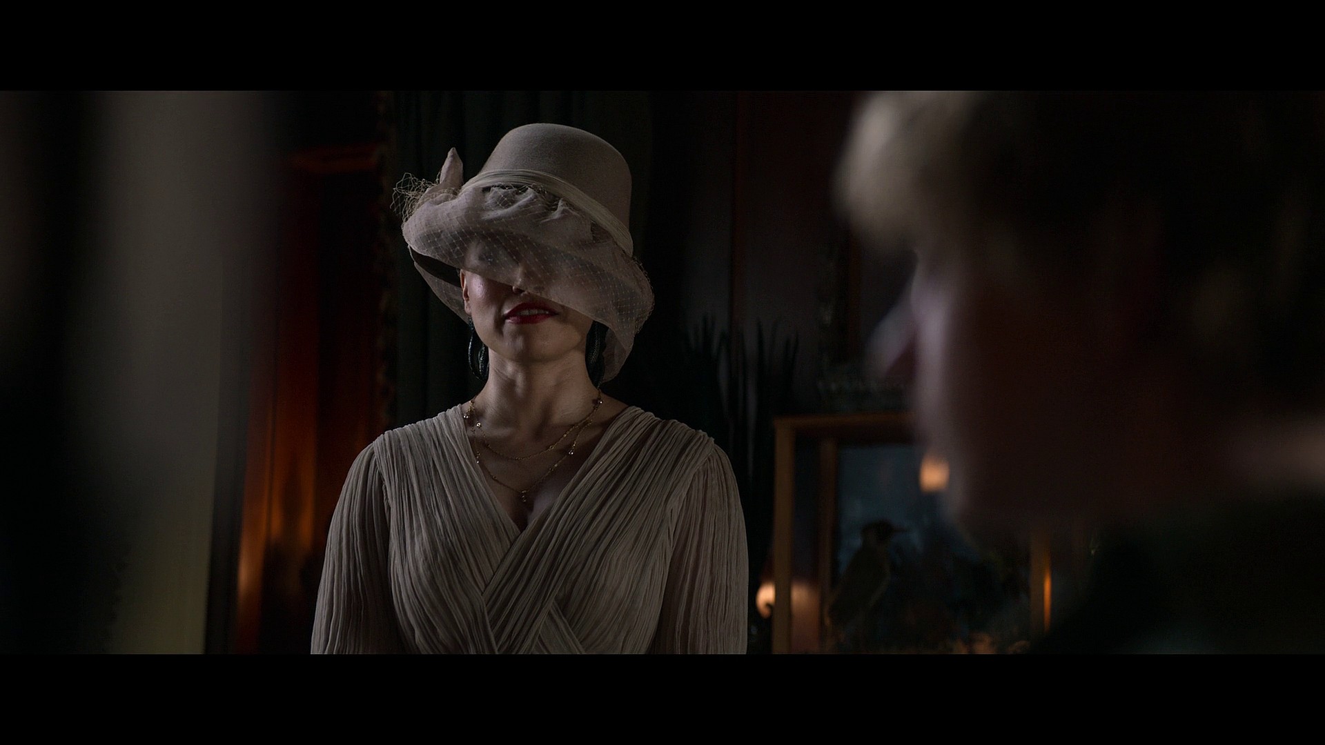 Medusa (Jessica Parker Kennedy) hosts Percy (Walker Scobell), Grover (Aryan Simhadri), and Leah Jeffries (Annabeth Chase) for lunch in Percy Jackson and The Olympians Season 1 Episode 3 "We Visit the Garden Gnome Emporium" (2023), Disney Plus