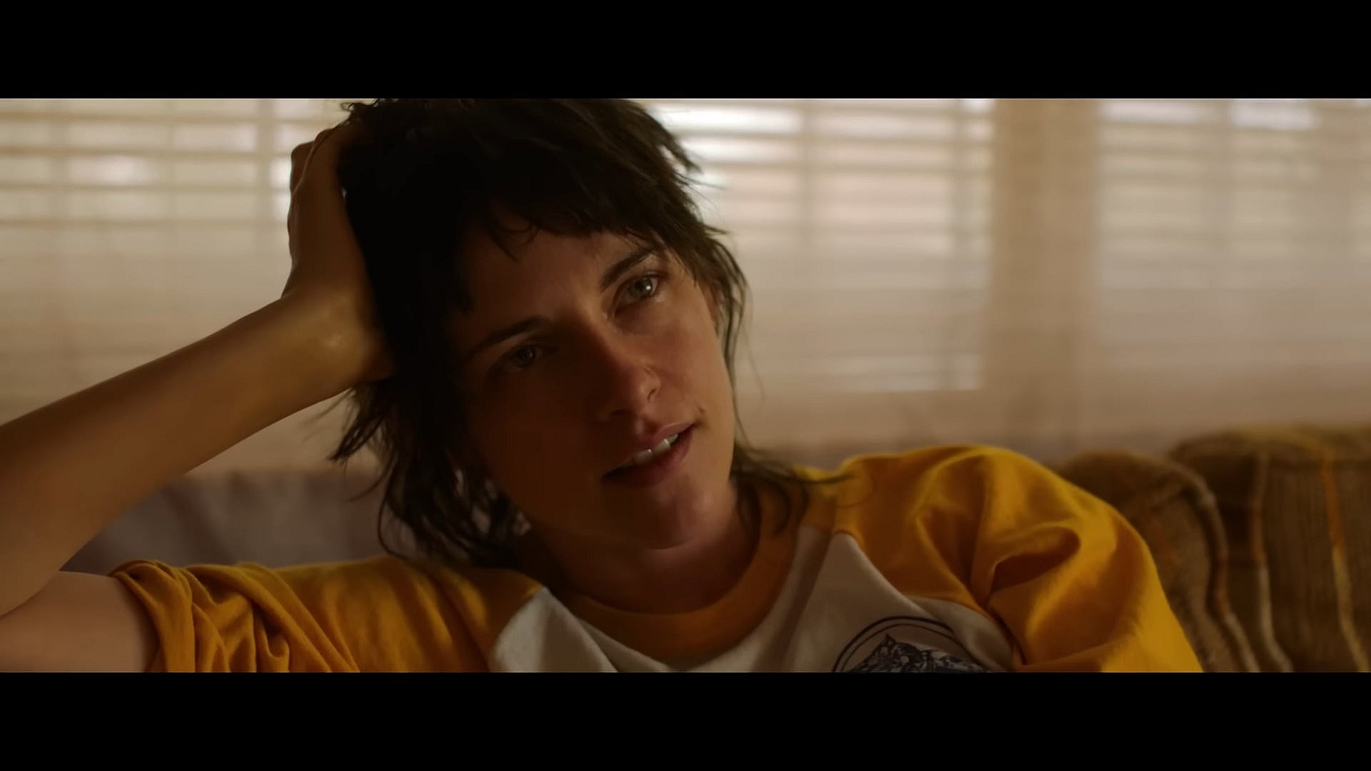 Lou (Kristen Stewart) finds herself falling for Jackie (Katy O'Brian) in Love Lies Bleeding (2024), A24