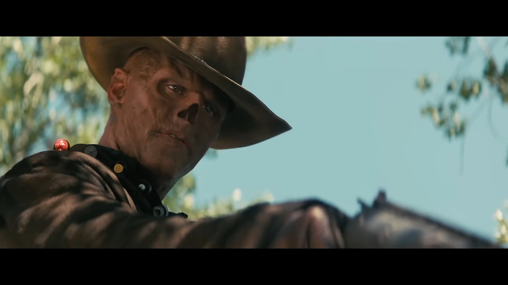 Cooper (Walton Goggins) draws his revolver on Lucy (Ella Purnell) in Fallout (2024), Amazon Prime Studios